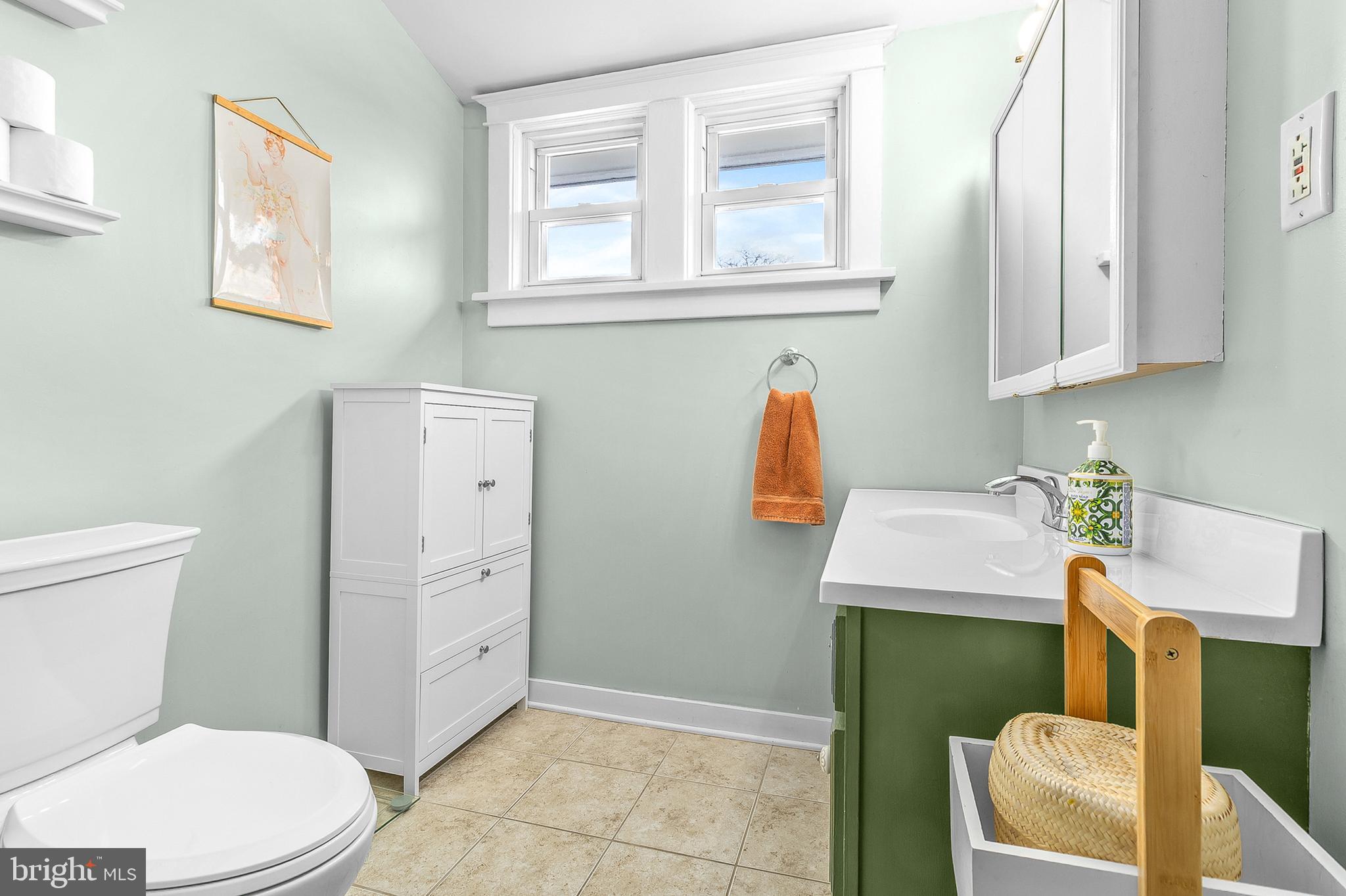 363 Washington Street Mount Holly, NJ 08060 - Photo 15 of 23 a bathroom with a toilet and a sink