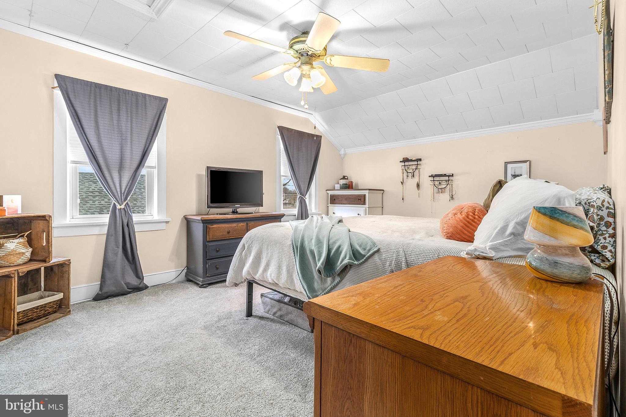 363 Washington Street Mount Holly, NJ 08060 - Photo 17 of 23 a bedroom with furniture and a flat screen tv