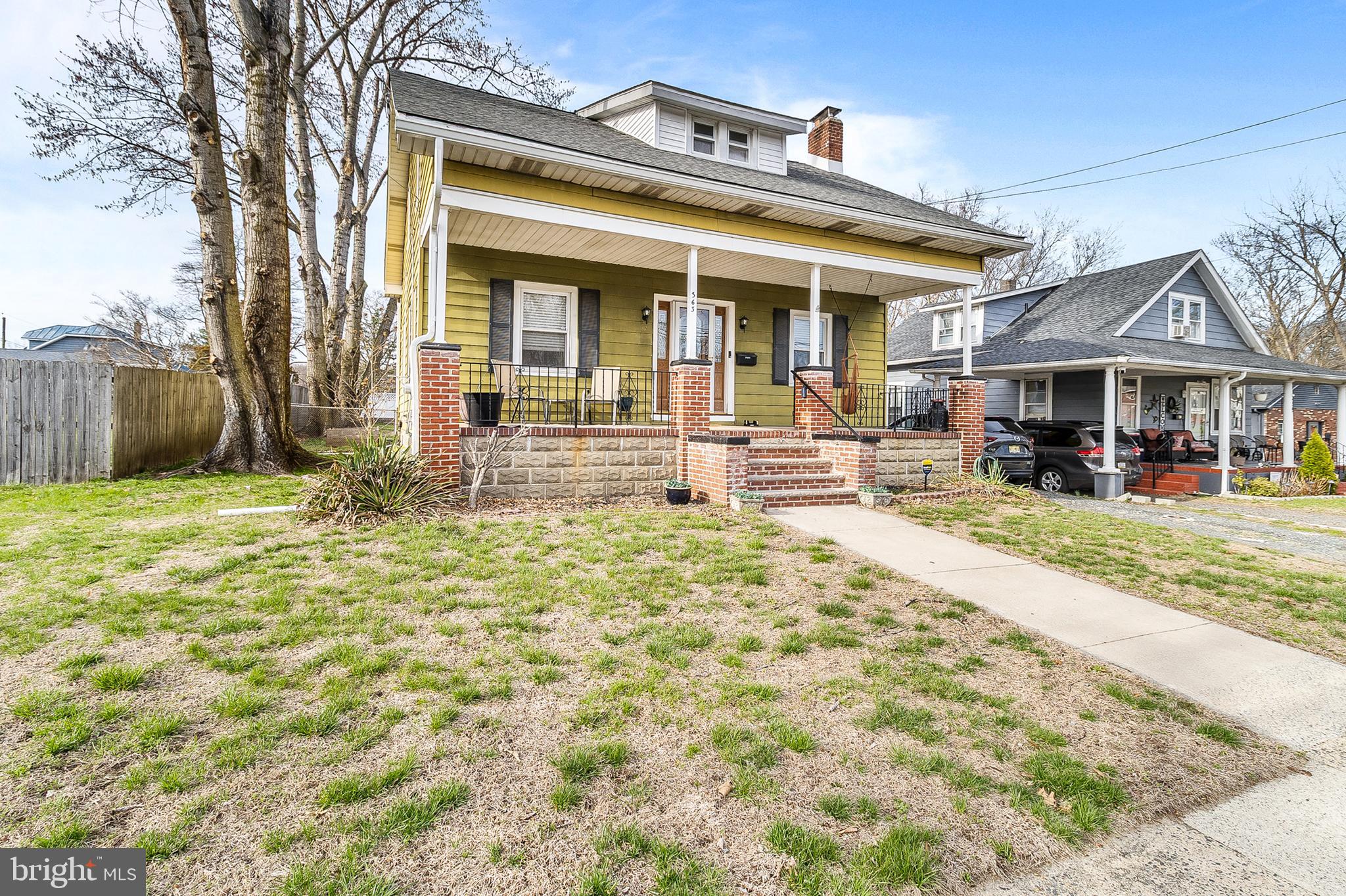 363 Washington Street Mount Holly, NJ 08060 - Photo 2 of 23 front view of a house with a yard