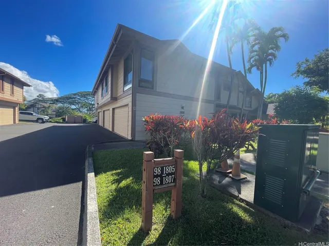 a backyard of a house with lots of green space