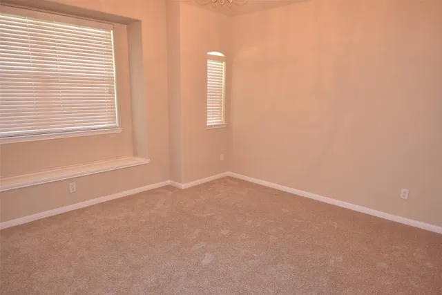 an empty room with a window