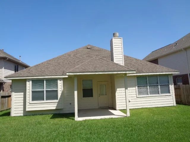 a house view with a garden space