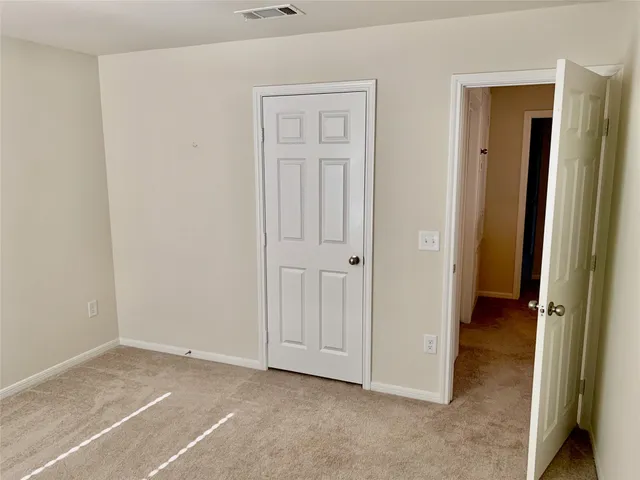 a view of a room with an empty space