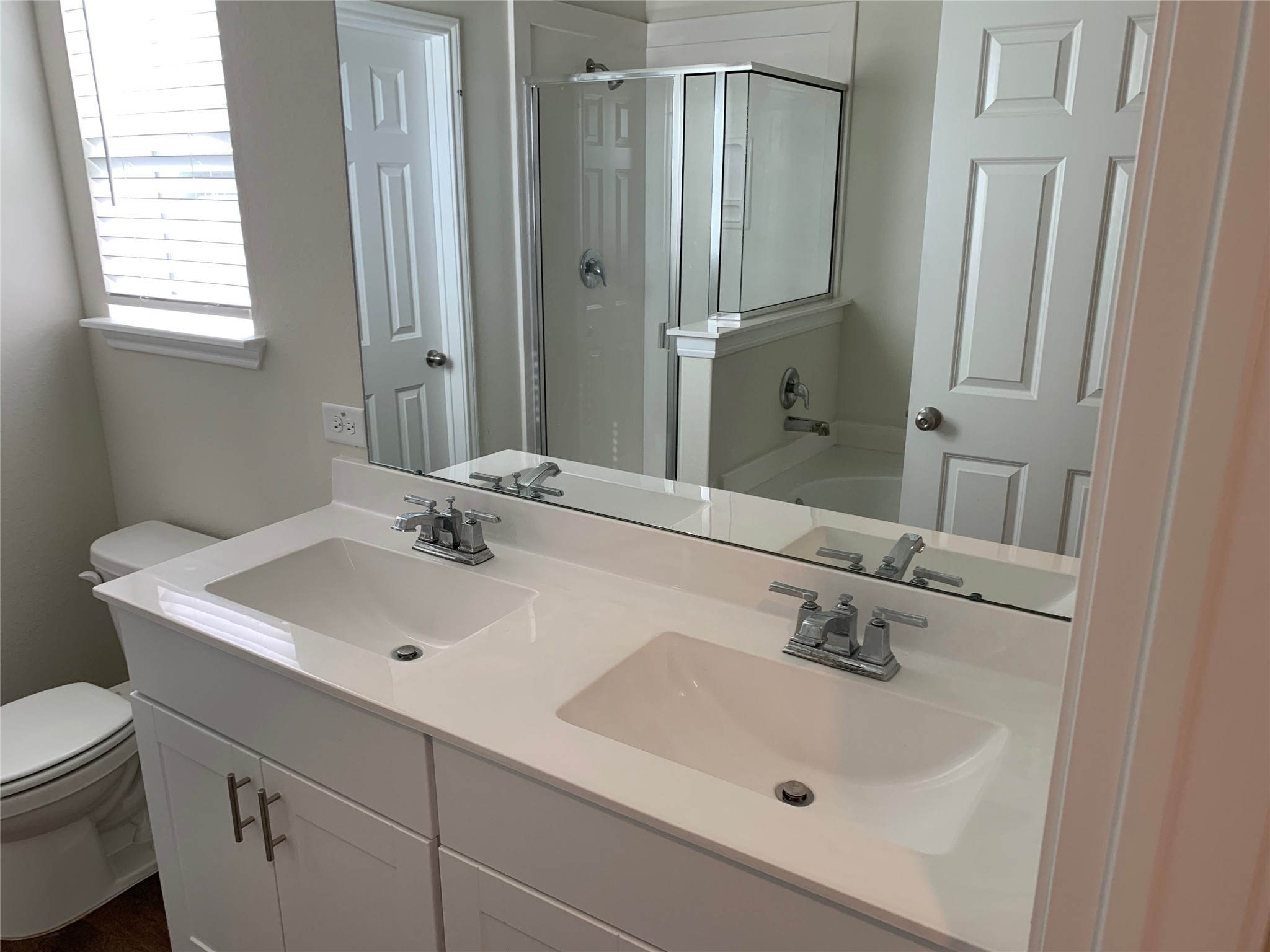 4622 Falling Sun Drive Houston, TX 77069 - Photo 8 of 28 a bathroom with a sink a toilet and a mirror