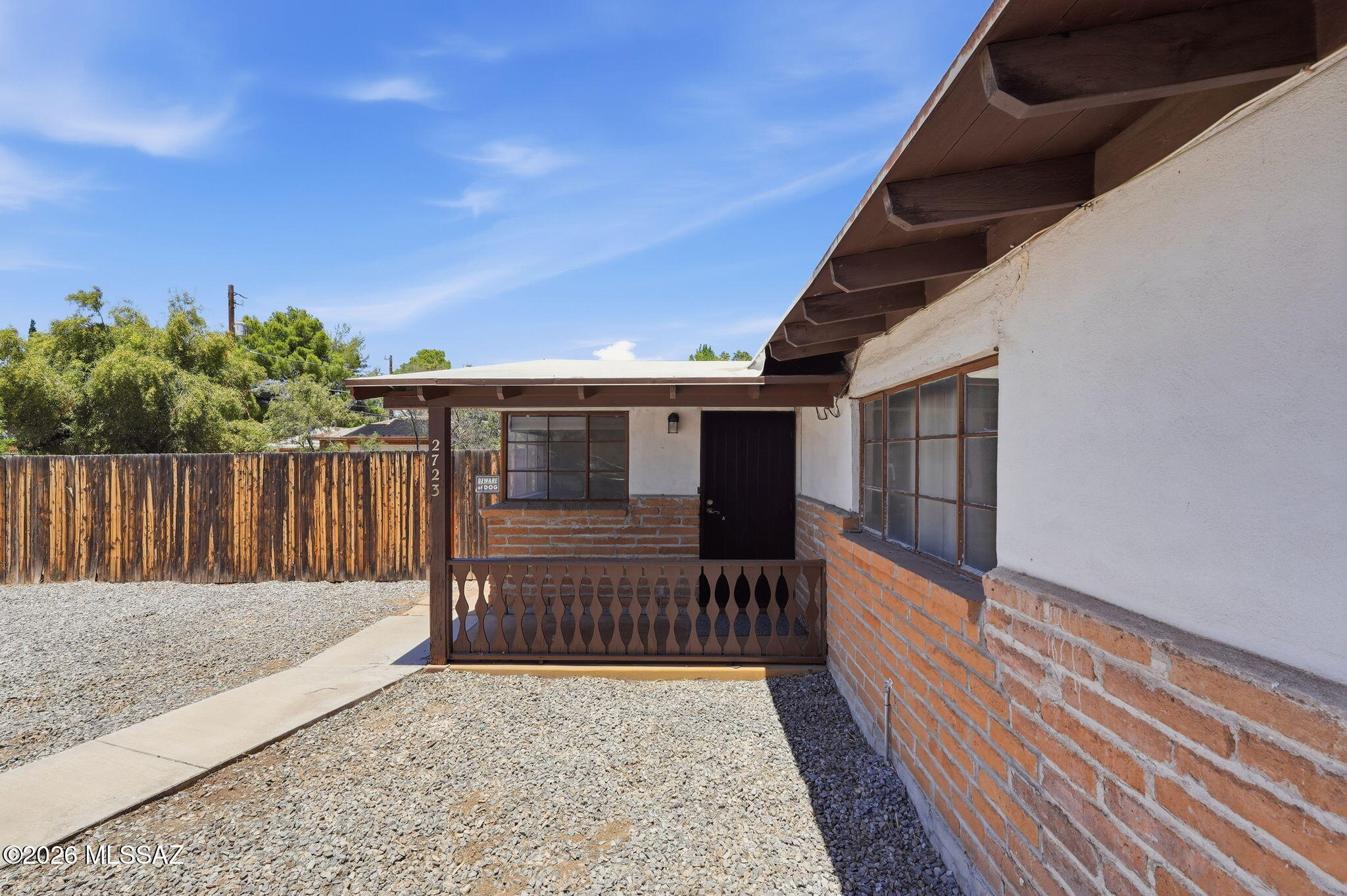 2721 East Fort Lowell Road Tucson, AZ 85716 - Photo 3 of 28 a porch with wooden floor