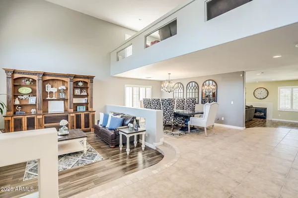 a living room with furniture and a table
