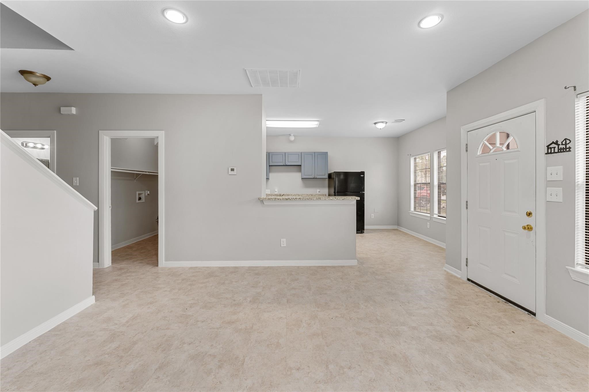9610 Buffum Street, Unit B Houston, TX 77051 - Photo 11 of 25 a view of a kitchen with refrigerator and a sink