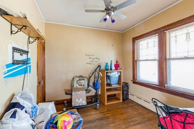 a bedroom with furniture and a window