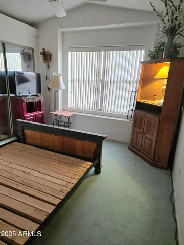a kitchen with a stove and a refrigerator