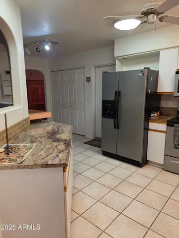 a view of living room with furniture and flat screen tv