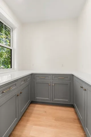 a view of a kitchen with dishwasher and cabinets