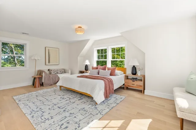 a bathroom with 2 sink tub and a mirror