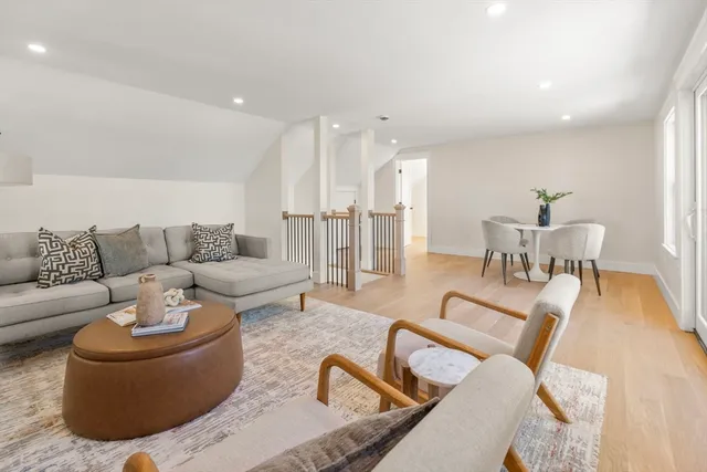 a view of house with yard outdoor seating and deck