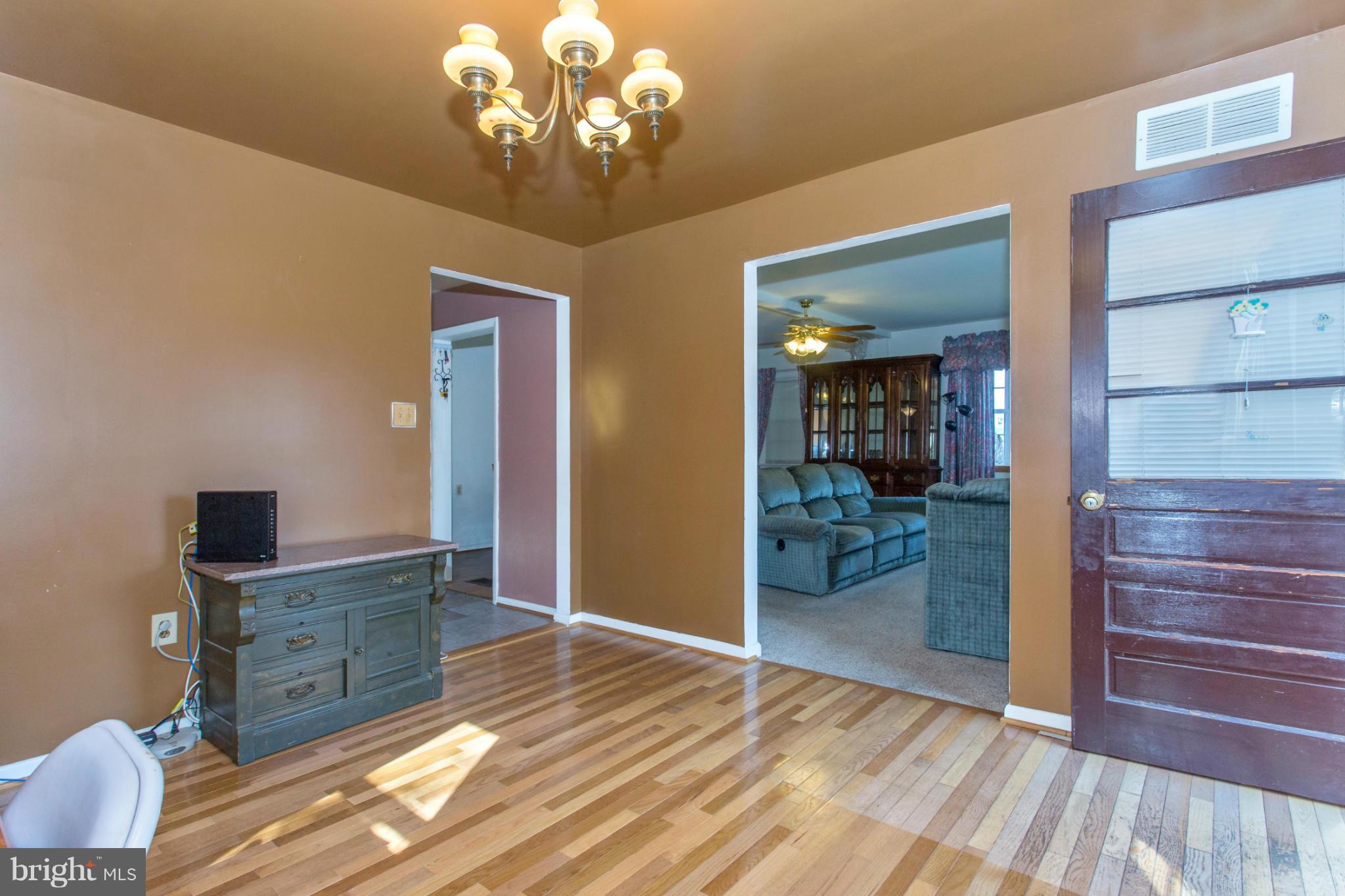 1838 Pleasant View Road Adamstown, MD 21710 - Photo 15 of 26 wooden floor in an empty room with a mirror