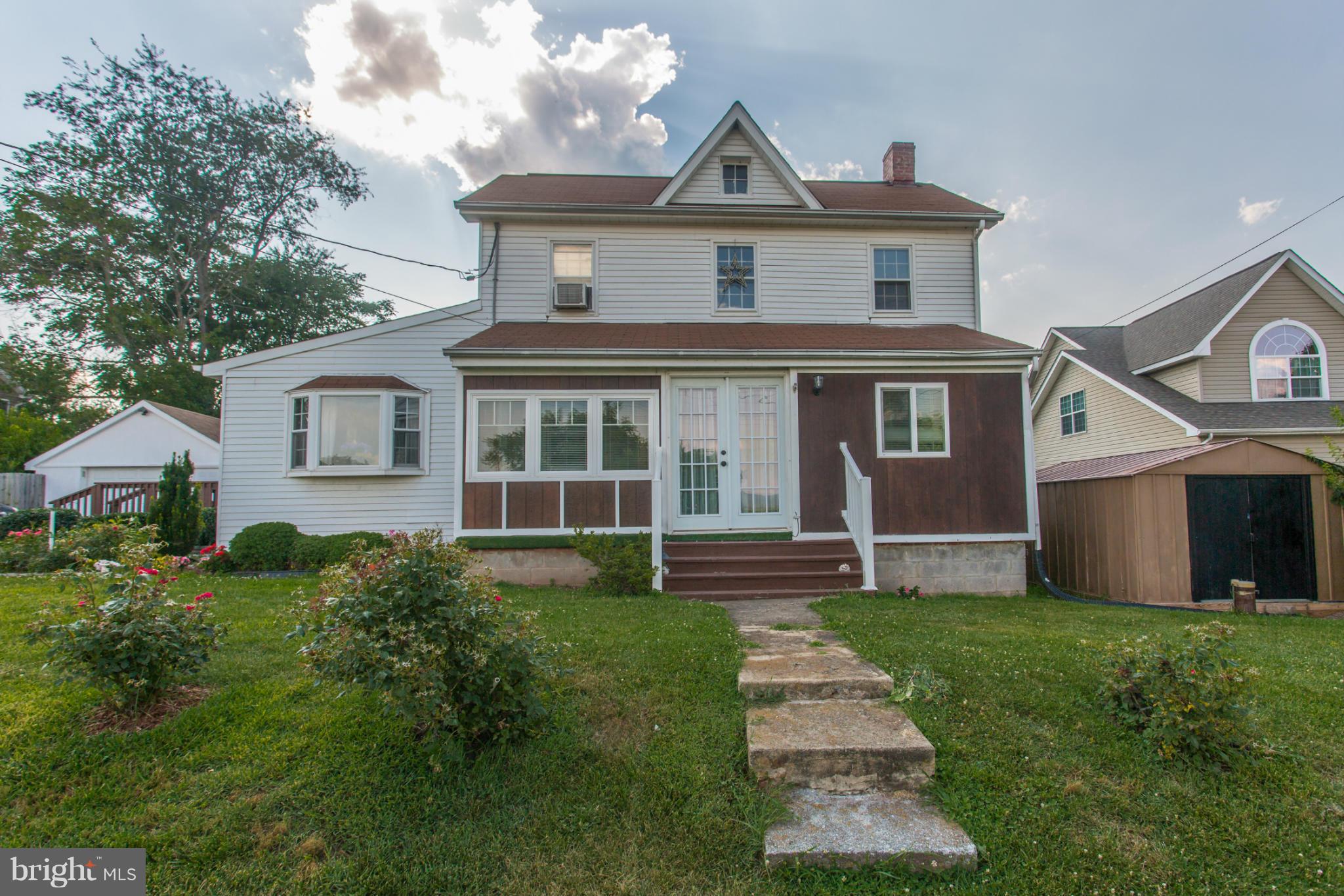 1838 Pleasant View Road Adamstown, MD 21710 - Photo 2 of 26 a front view of a house with a yard