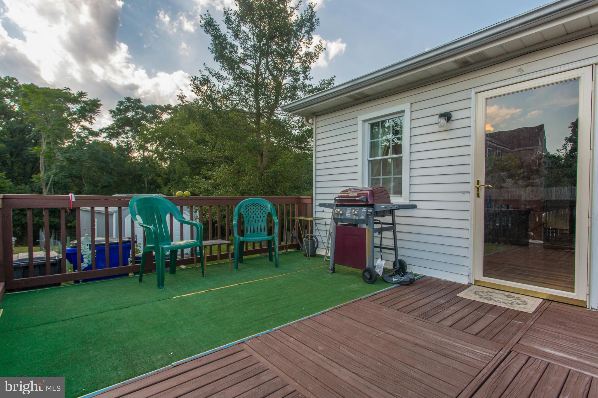 1838 Pleasant View Road Adamstown, MD 21710 - Photo 4 of 26 a view of a chairs and a room in the back