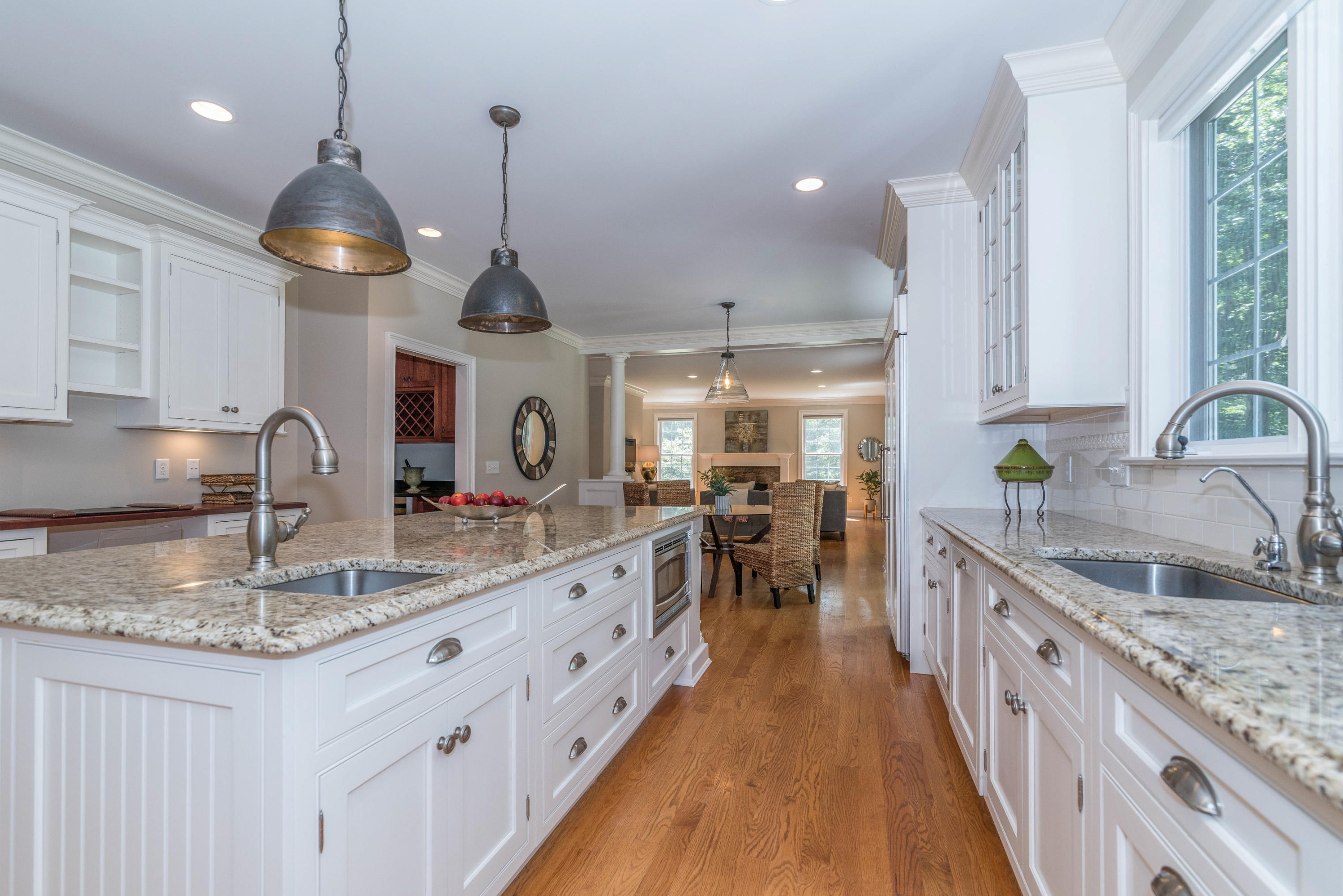 42 Mariomi Road New Canaan, CT 06840 - Photo 11 of 28 a kitchen with sink stove and cabinets