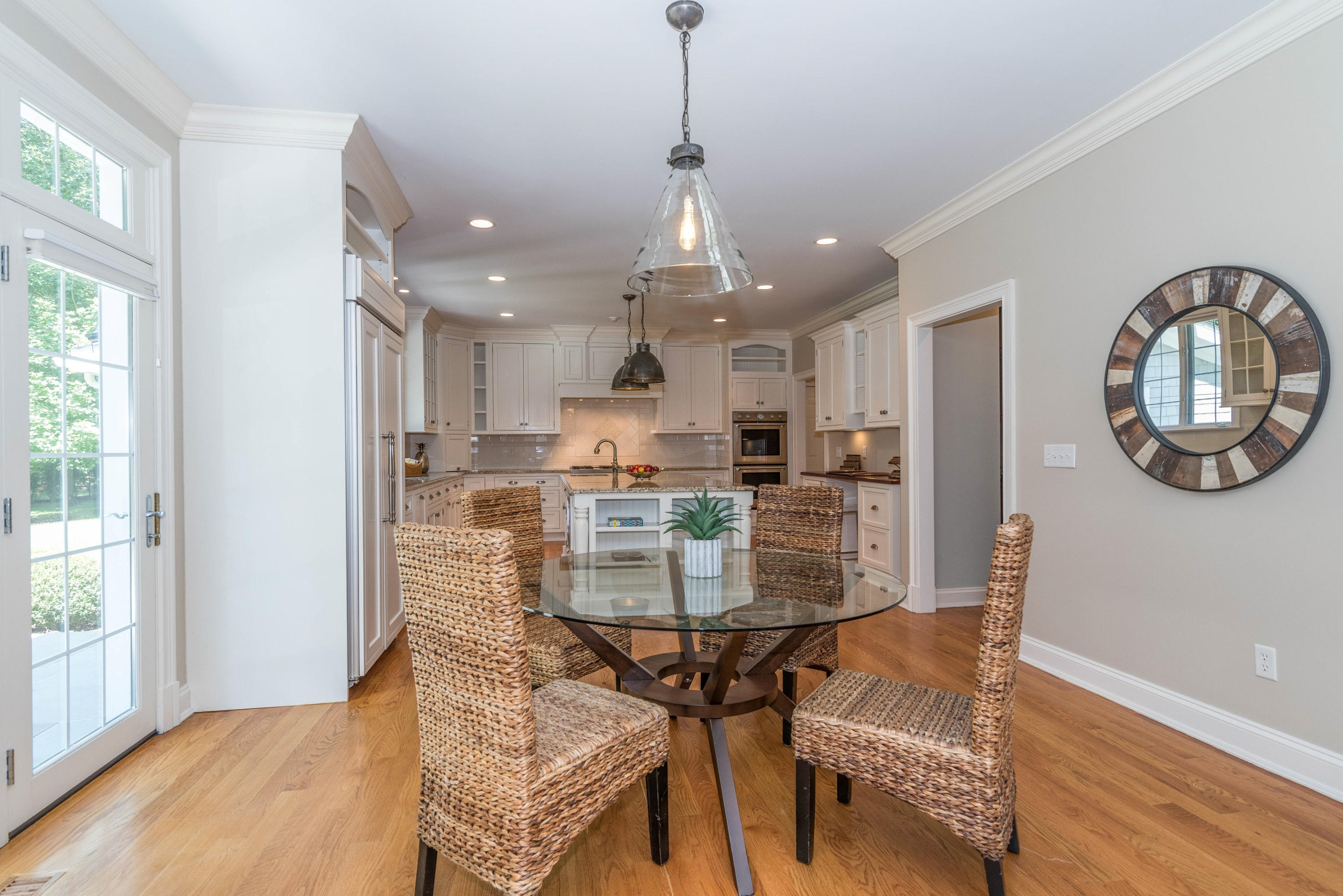 42 Mariomi Road New Canaan, CT 06840 - Photo 12 of 28 a view of a dining room with furniture and a chandelier