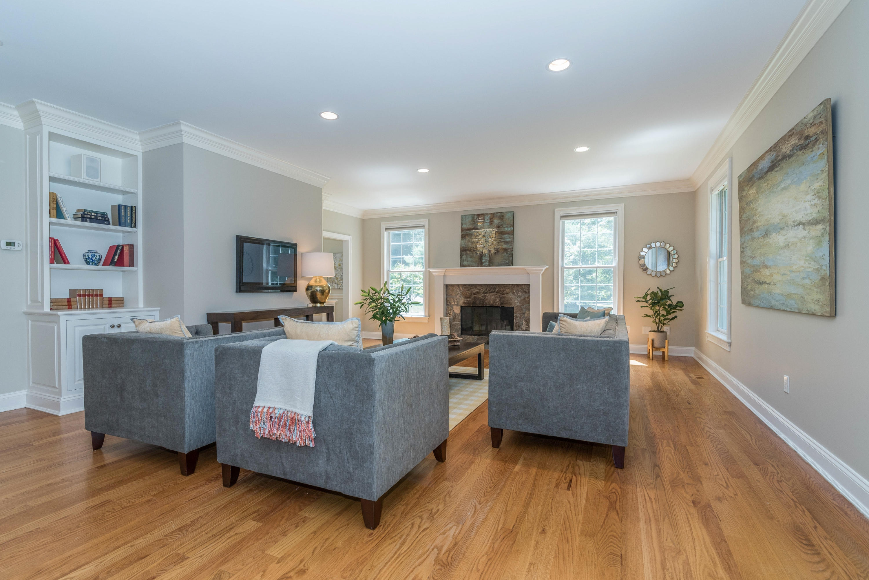 42 Mariomi Road New Canaan, CT 06840 - Photo 14 of 28 a living room with furniture and a flat screen tv