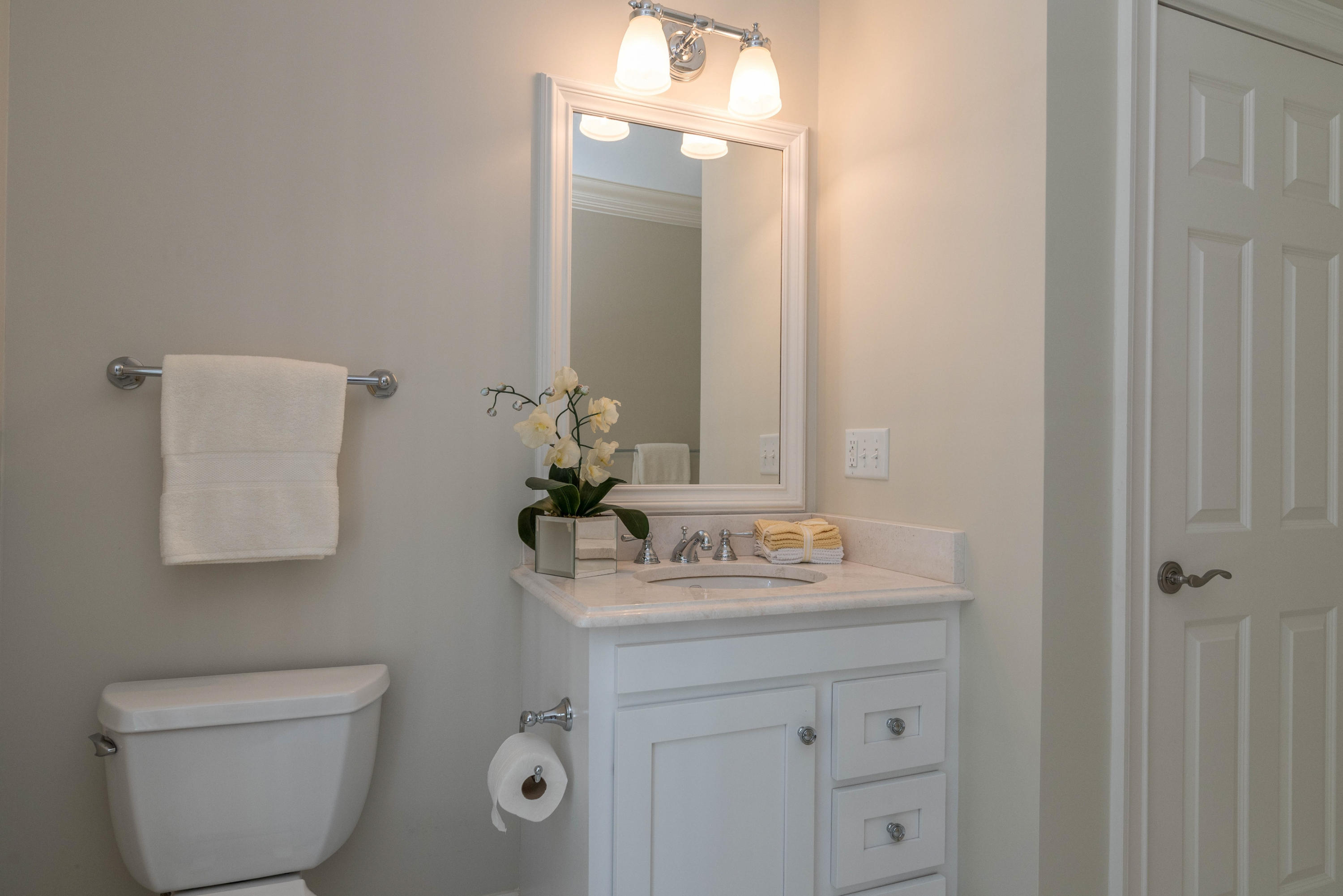 42 Mariomi Road New Canaan, CT 06840 - Photo 21 of 28 a bathroom with a toilet sink and mirror