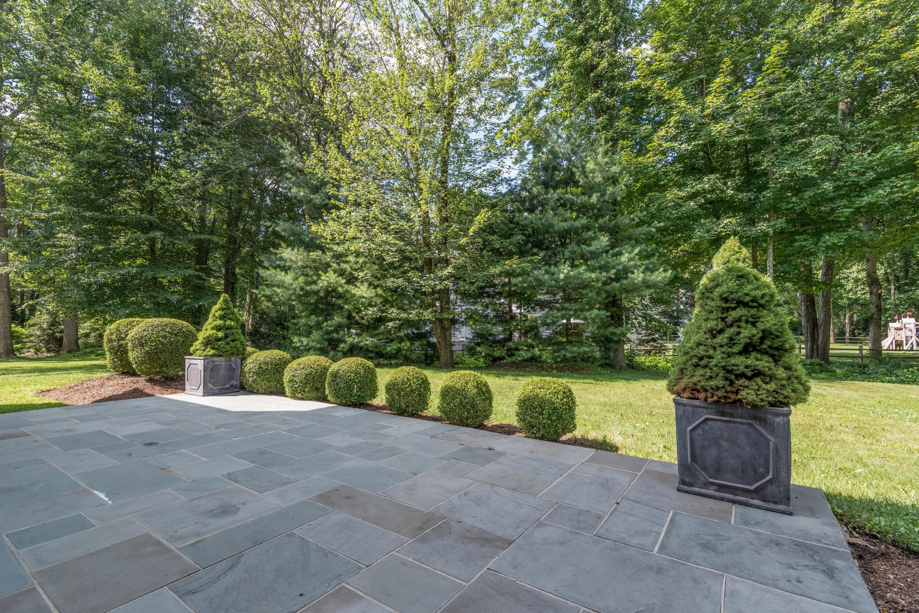 42 Mariomi Road New Canaan, CT 06840 - Photo 23 of 28 a view of an outdoor space with a house