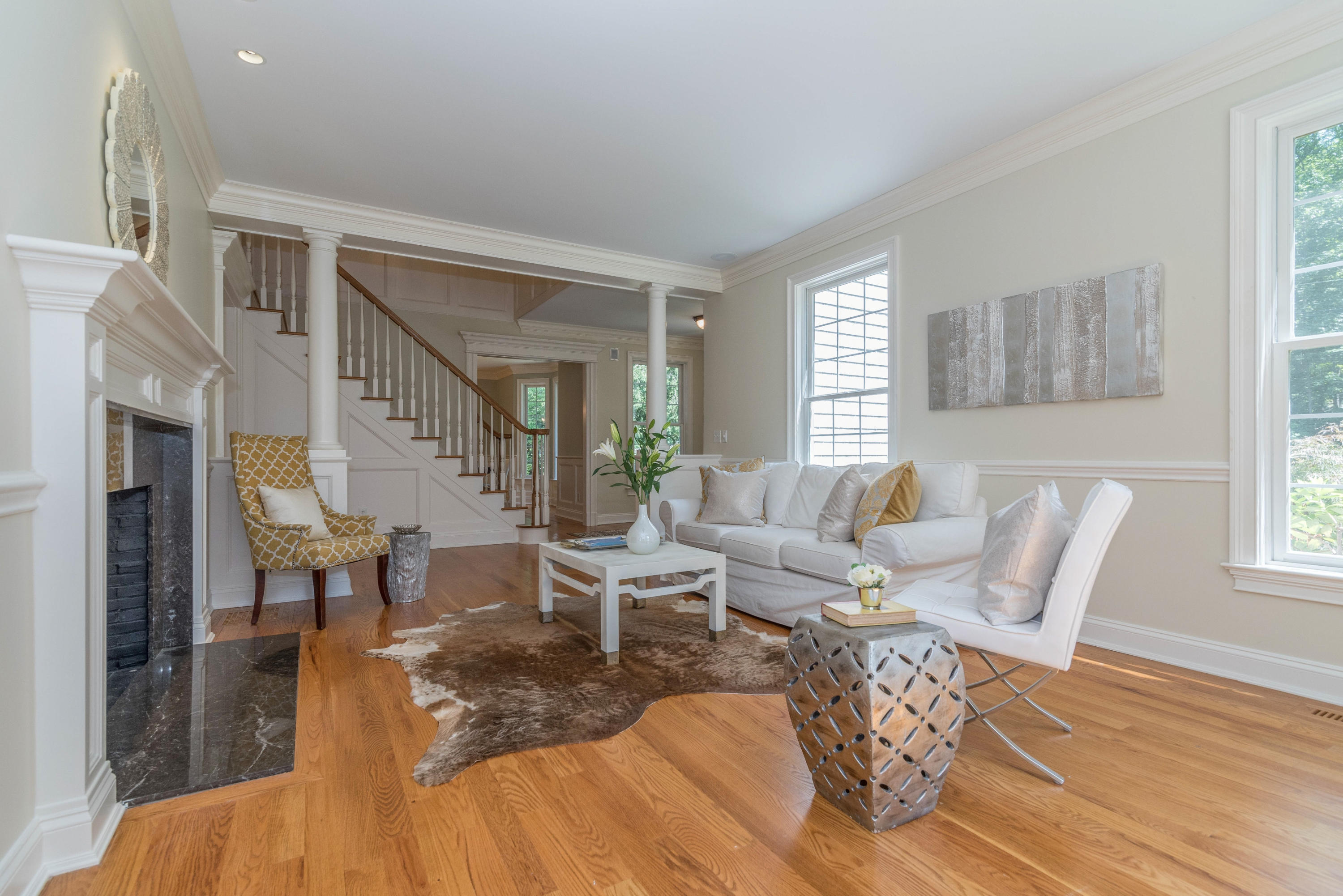 42 Mariomi Road New Canaan, CT 06840 - Photo 5 of 28 a living room with fireplace furniture and a wooden floor