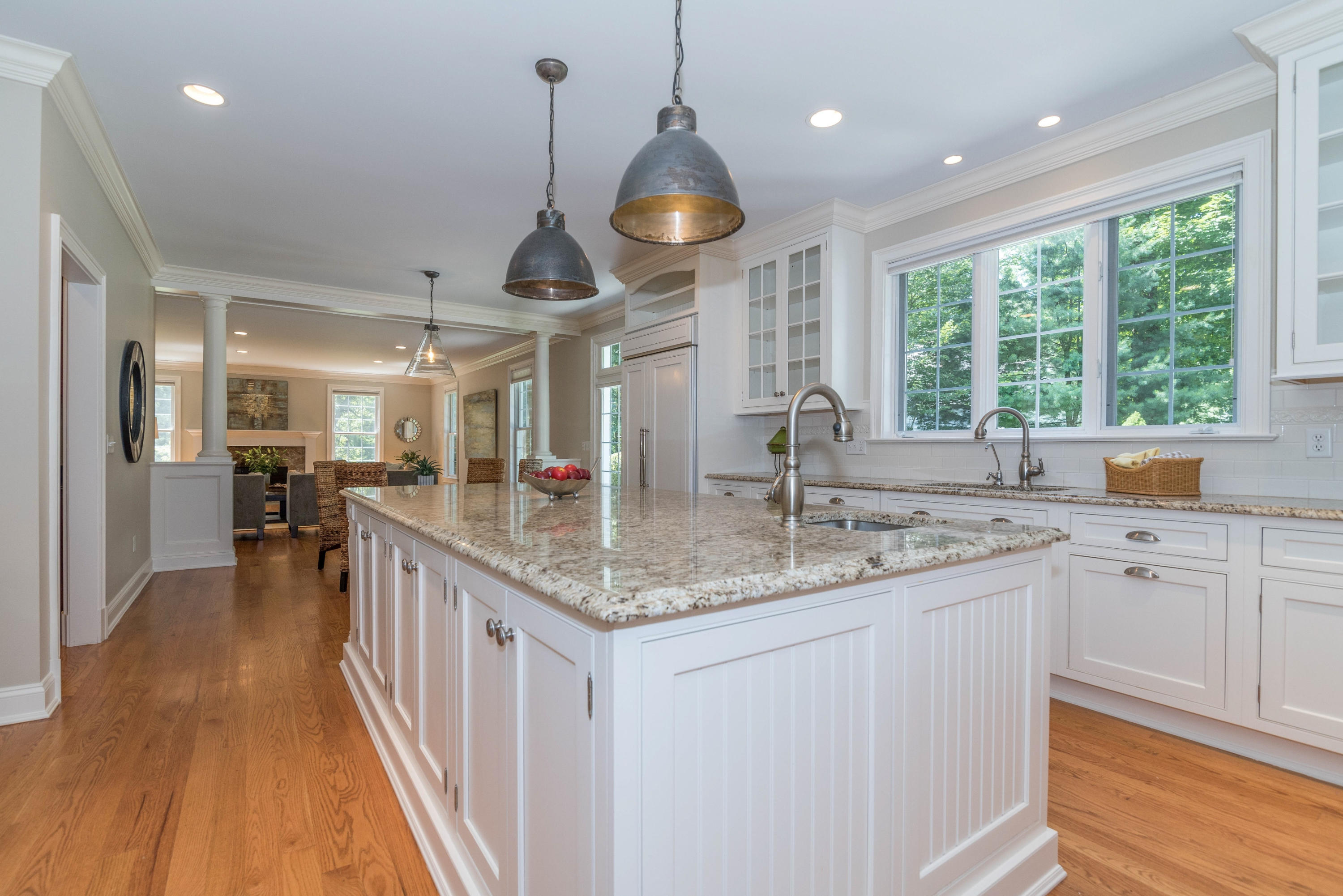 42 Mariomi Road New Canaan, CT 06840 - Photo 10 of 28 a kitchen with stainless steel appliances granite countertop a sink a stove and a wooden floors