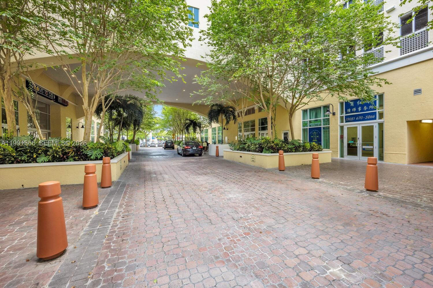 7350 Southwest 89th Street, Unit 1511S Miami, FL 33156 - Photo 24 of 29 a view of a building with many windows