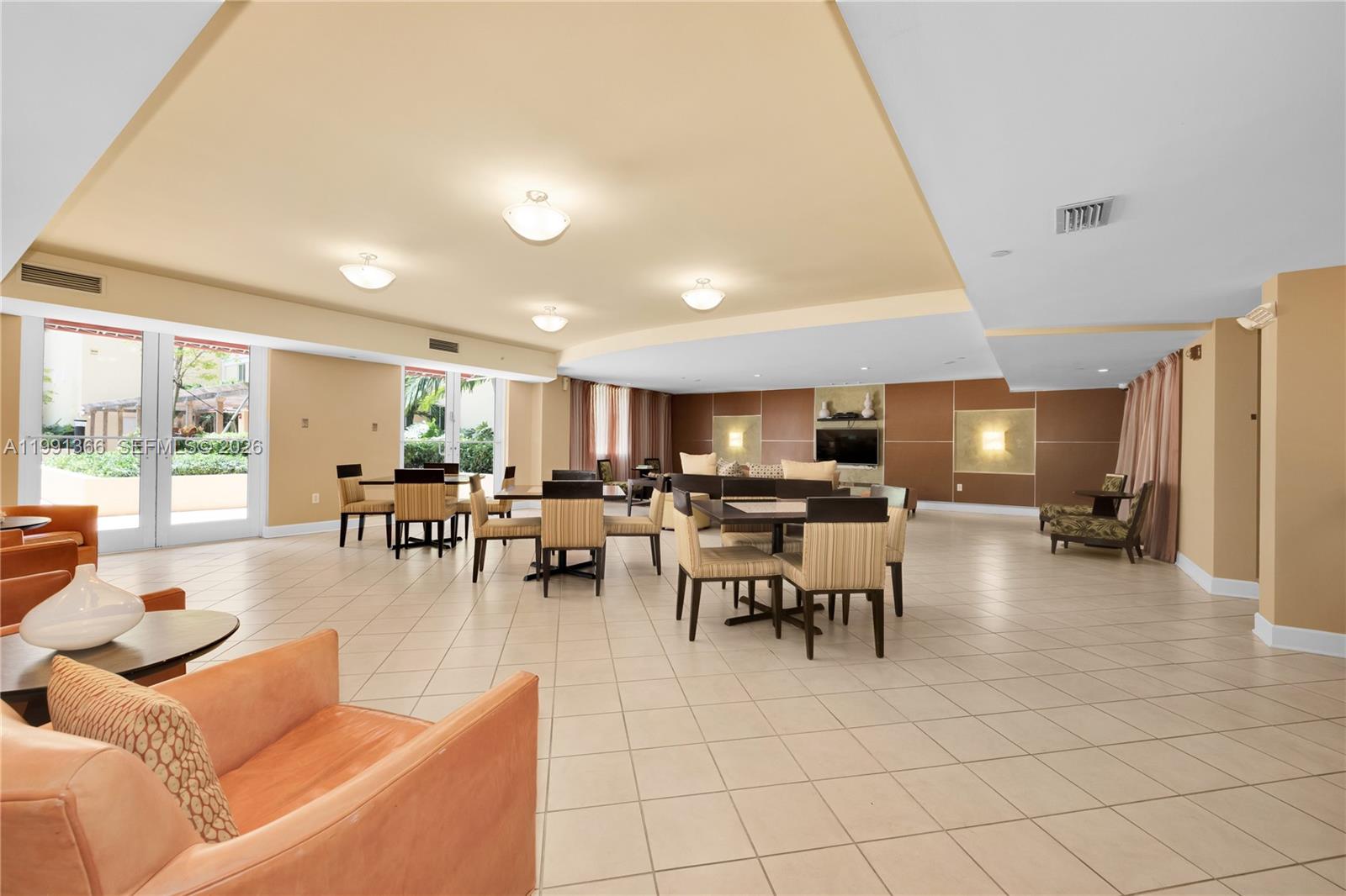 7350 Southwest 89th Street, Unit 1511S Miami, FL 33156 - Photo 28 of 29 a living room with furniture and a large window