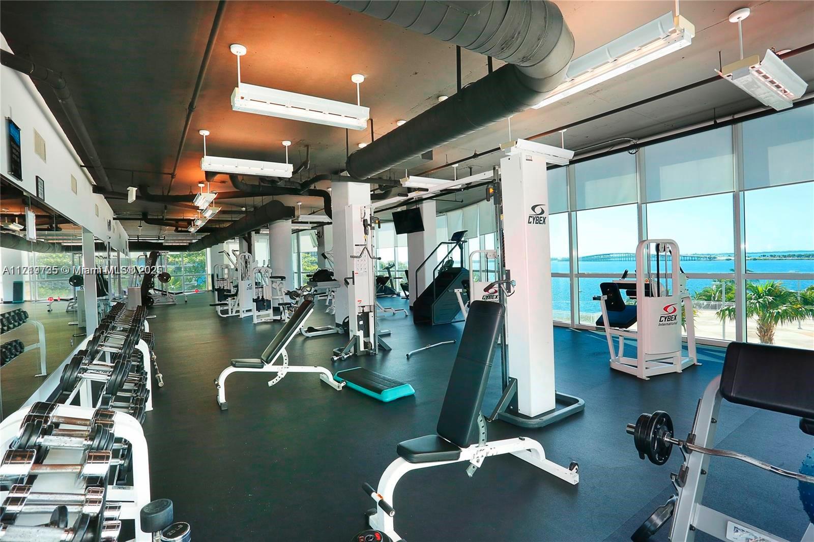 2101 Brickell Avenue, Unit 2103 Miami, FL 33129 - Photo 24 of 35 a view of a room with gym equipment