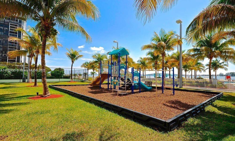 2101 Brickell Avenue, Unit 2103 Miami, FL 33129 - Photo 30 of 35 a view of a park with palm trees