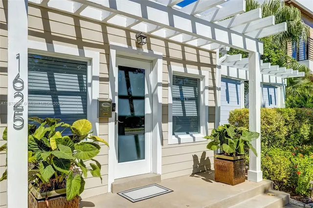 a view of a building with a potted plant