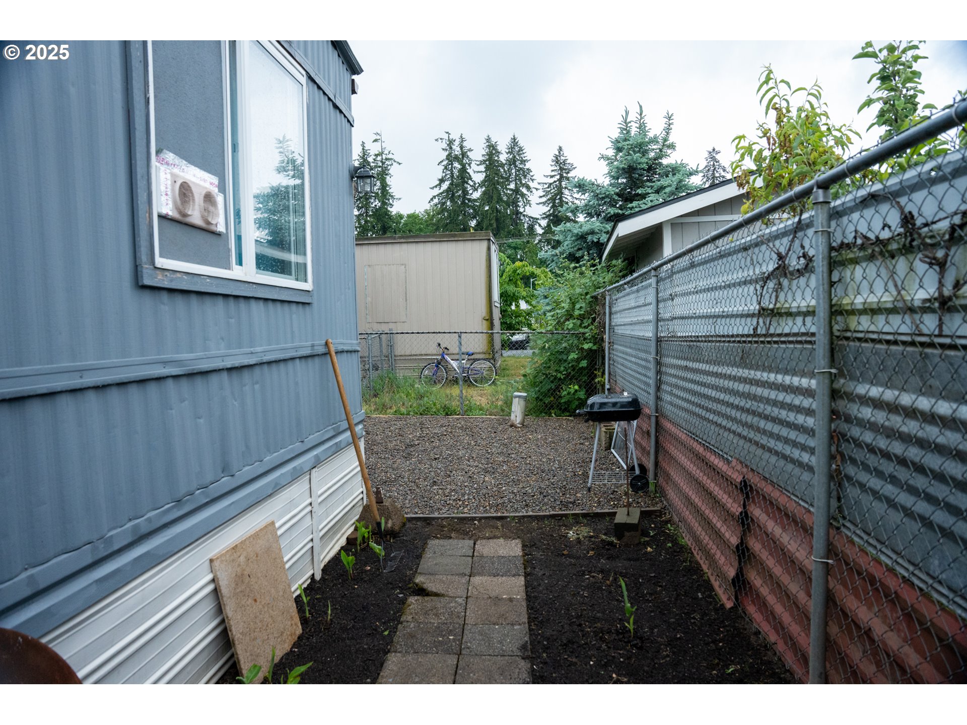 5335 Daisy Street, Unit TL 0130 Springfield, OR 97478 - Photo 6 of 17 a view of outdoor space and yard