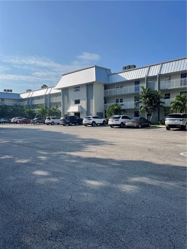 2980 Riverside Drive, Unit 1253 Coral Springs, FL 33065 - Photo 1 of 18 a view of a car garage