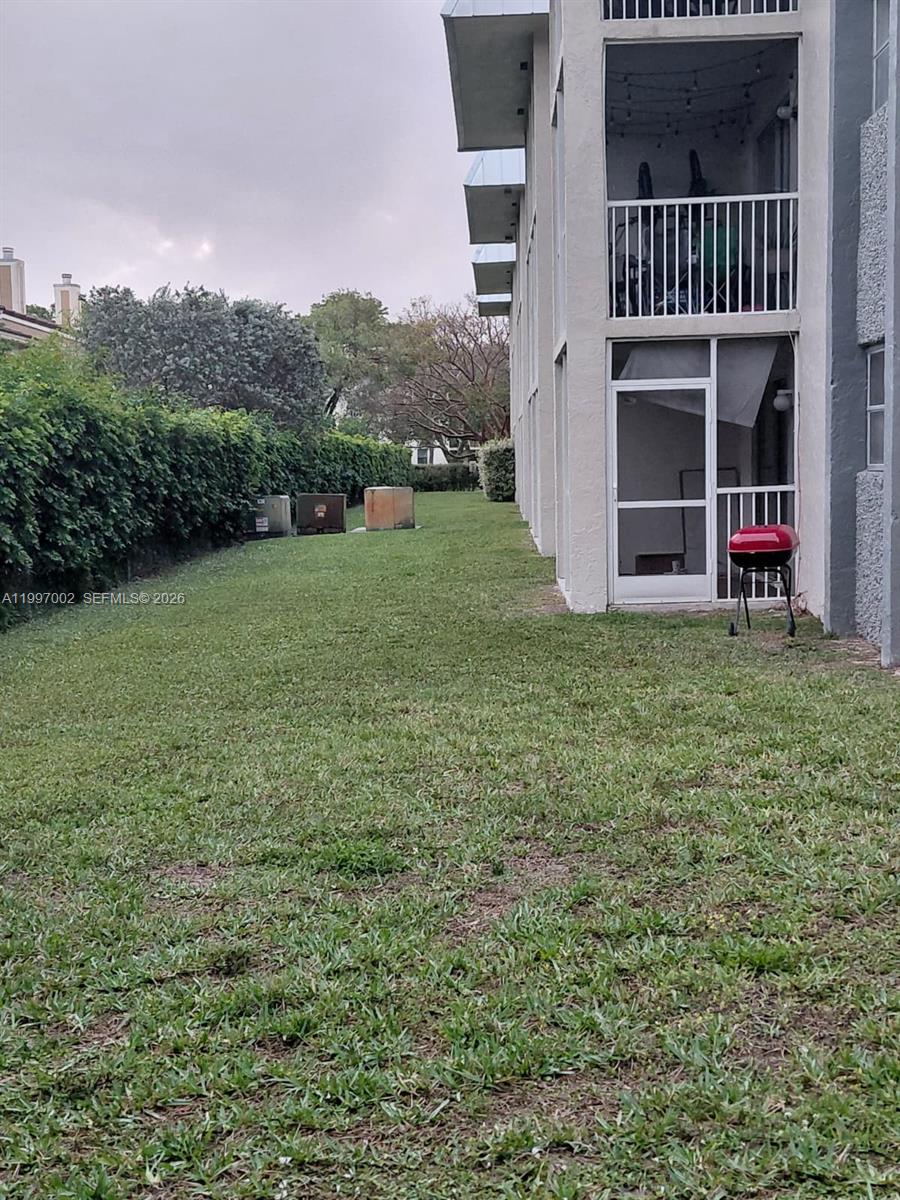 2980 Riverside Drive, Unit 1253 Coral Springs, FL 33065 - Photo 13 of 18 a view of a garden