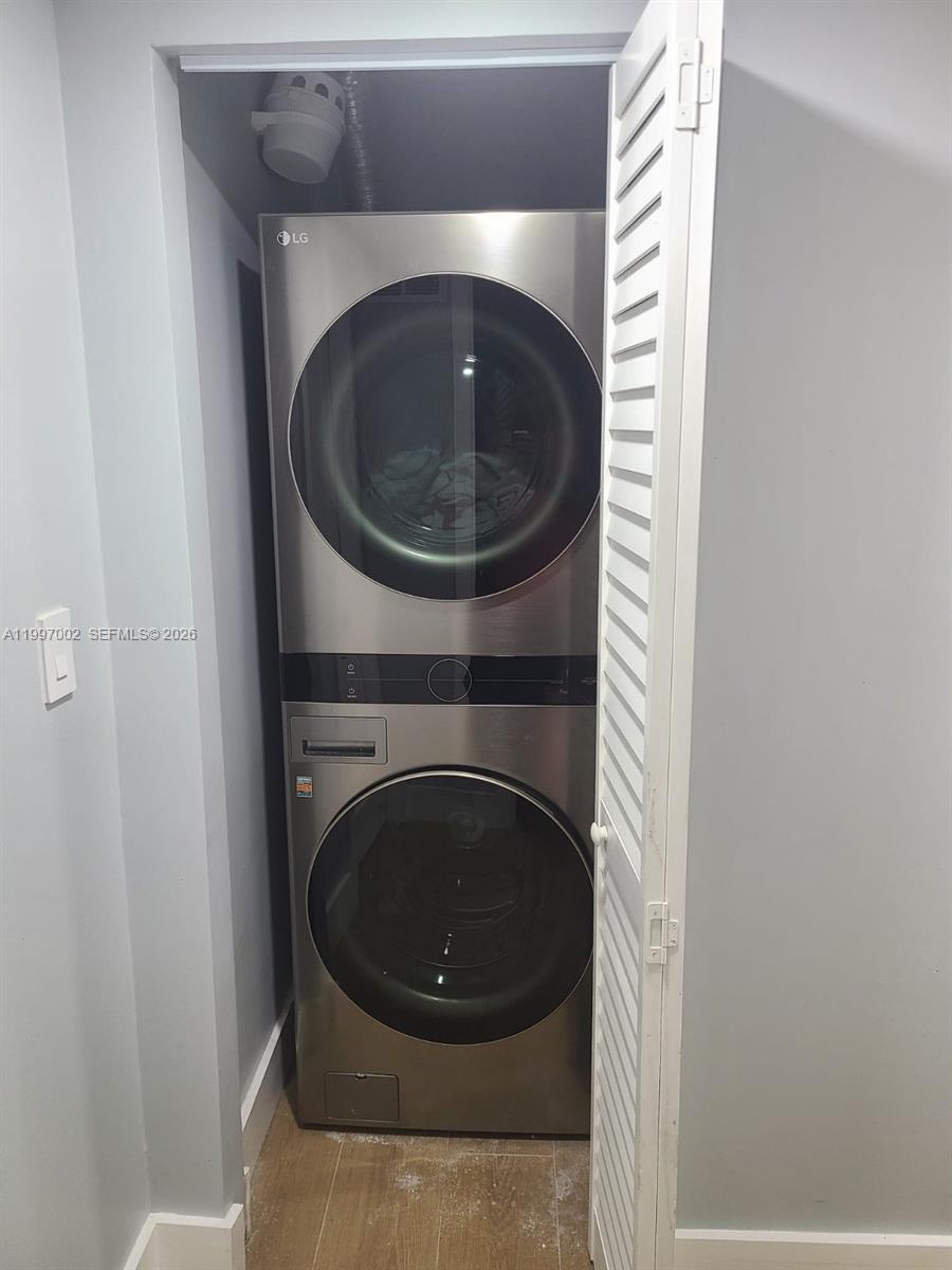 2980 Riverside Drive, Unit 1253 Coral Springs, FL 33065 - Photo 10 of 18 a close up view of a washer and dryer