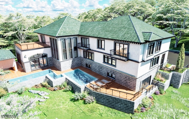 aerial view of a house with pool and chairs