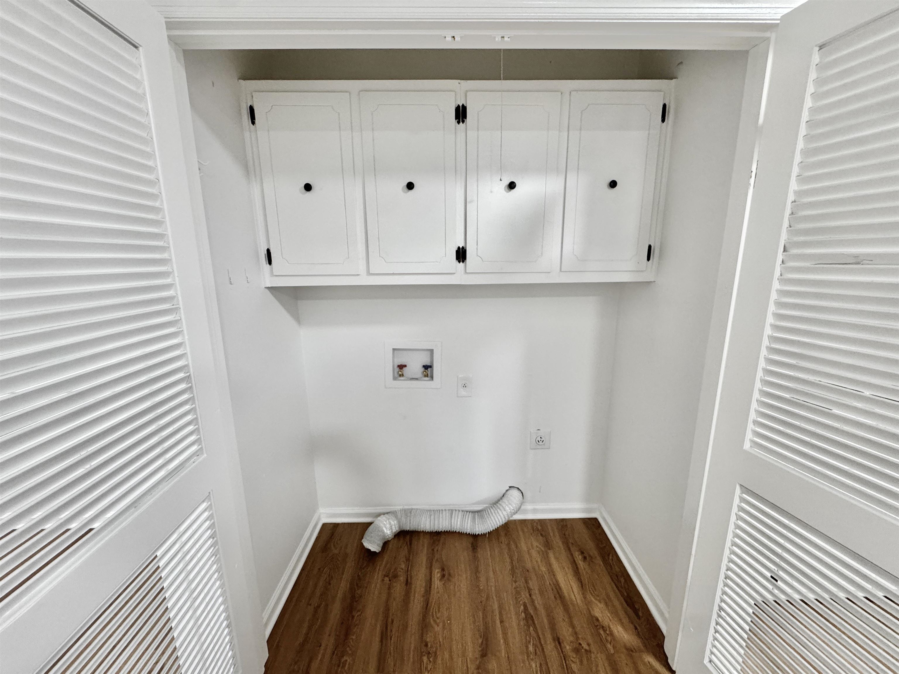 3209 Canyon Road Memphis, TN 38134 - Photo 23 of 30 a view of a closet with wooden floor