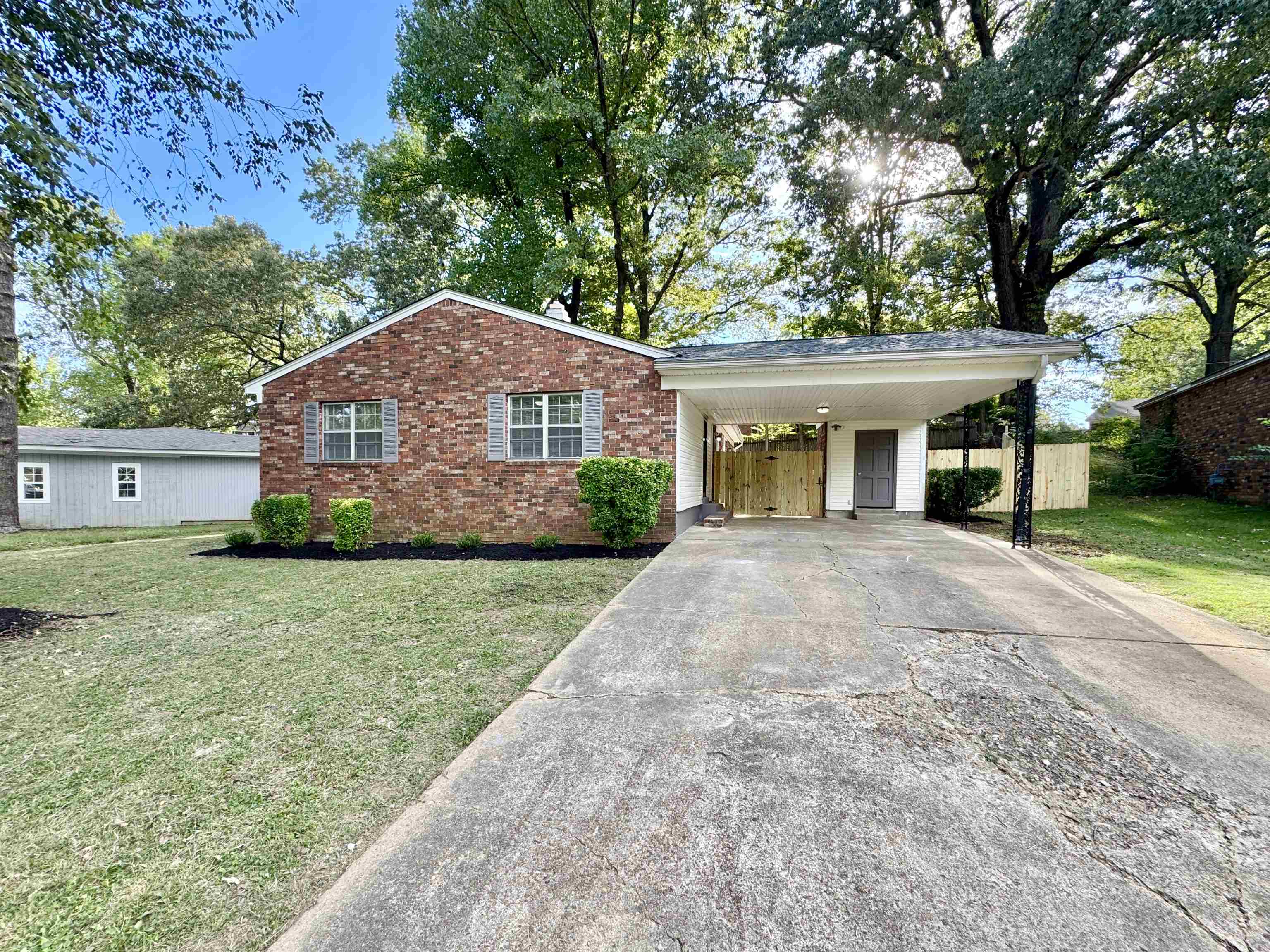 3209 Canyon Road Memphis, TN 38134 - Photo 28 of 30 a front view of a house with garden