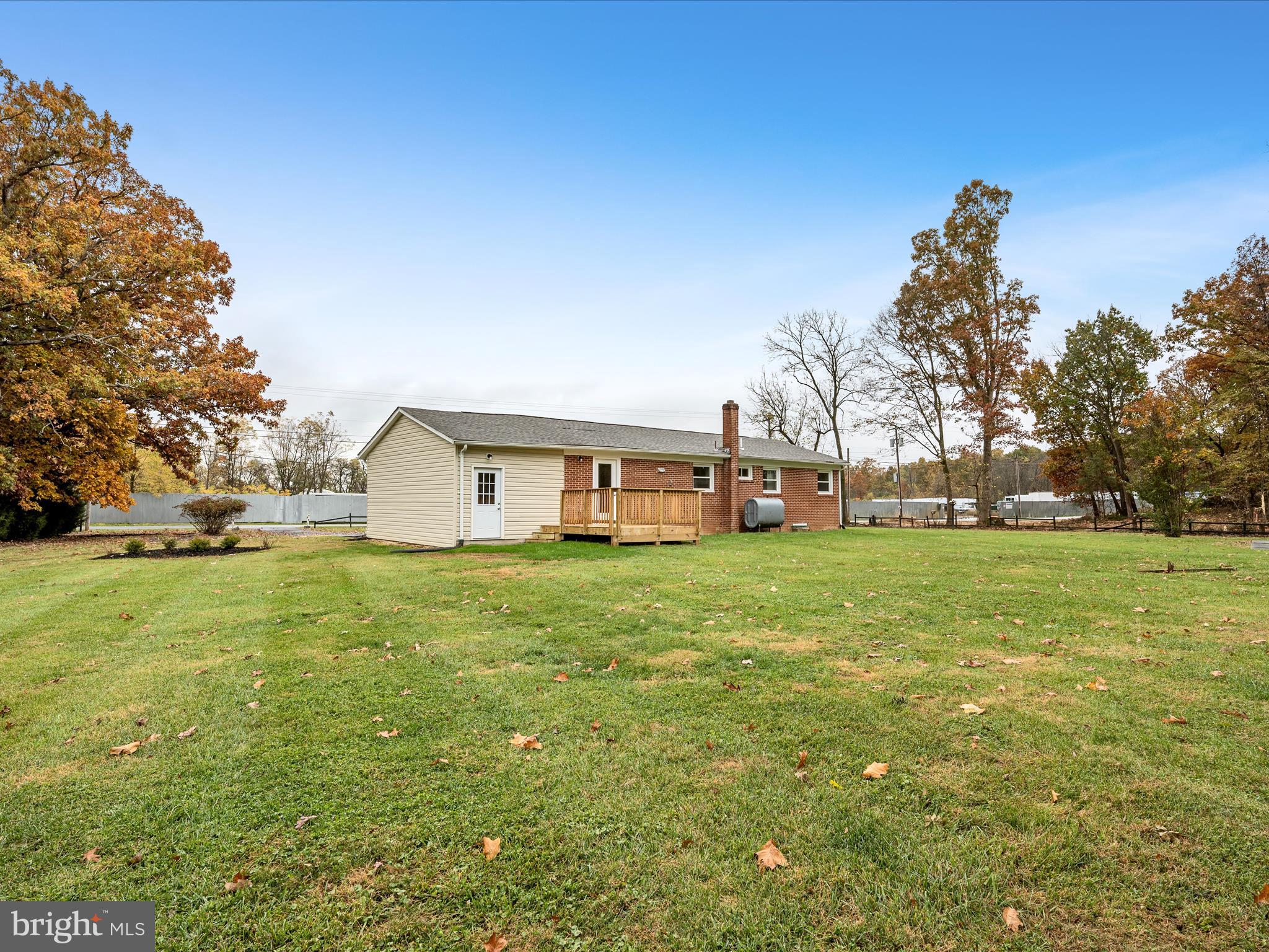 2311 Summit Point Road Summit Point, WV 25446 - Photo 36 of 46 a view of a house with a back yard