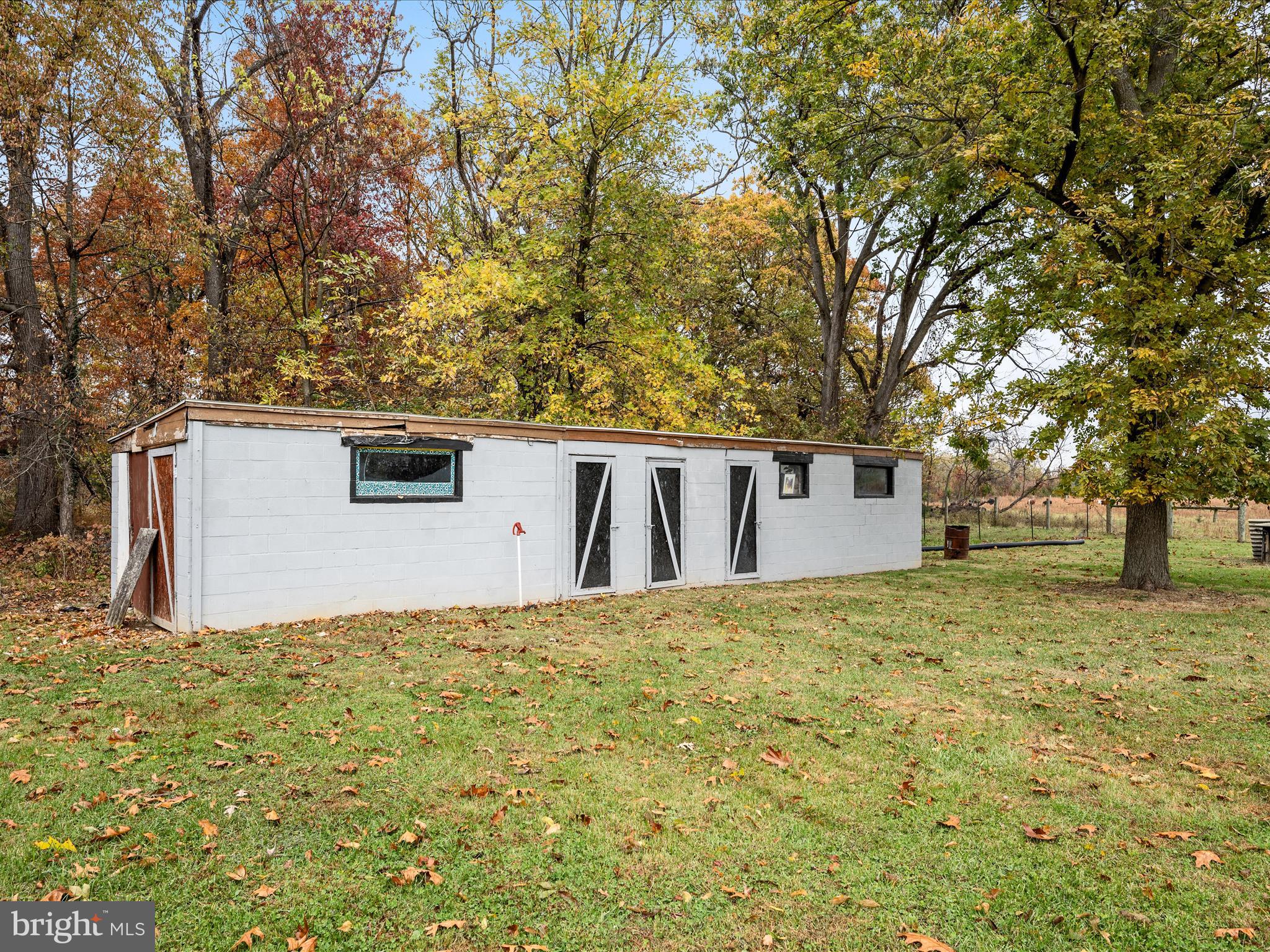 2311 Summit Point Road Summit Point, WV 25446 - Photo 38 of 46 a house with trees in front of it