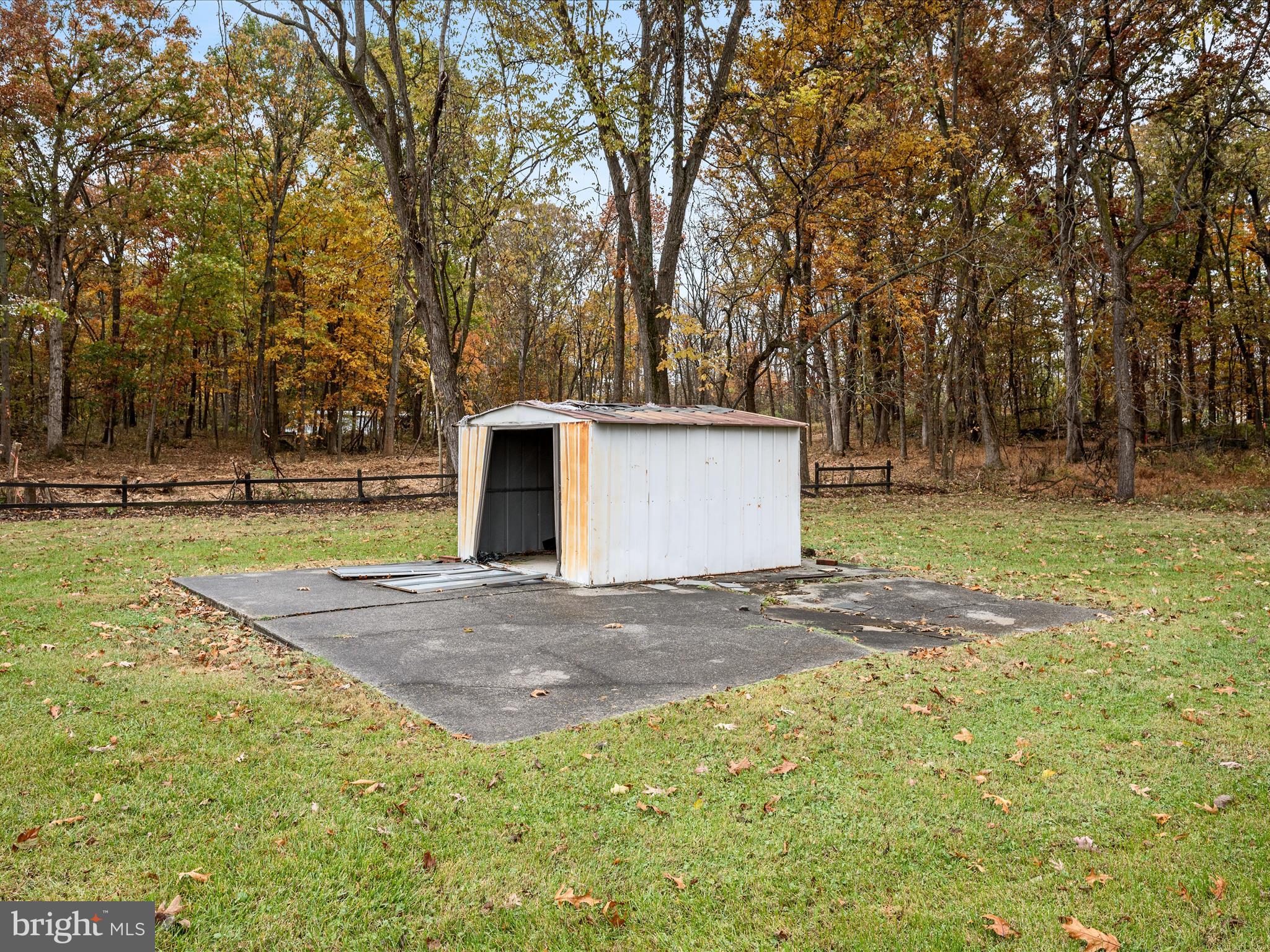 2311 Summit Point Road Summit Point, WV 25446 - Photo 39 of 46 a view of a backyard with large trees