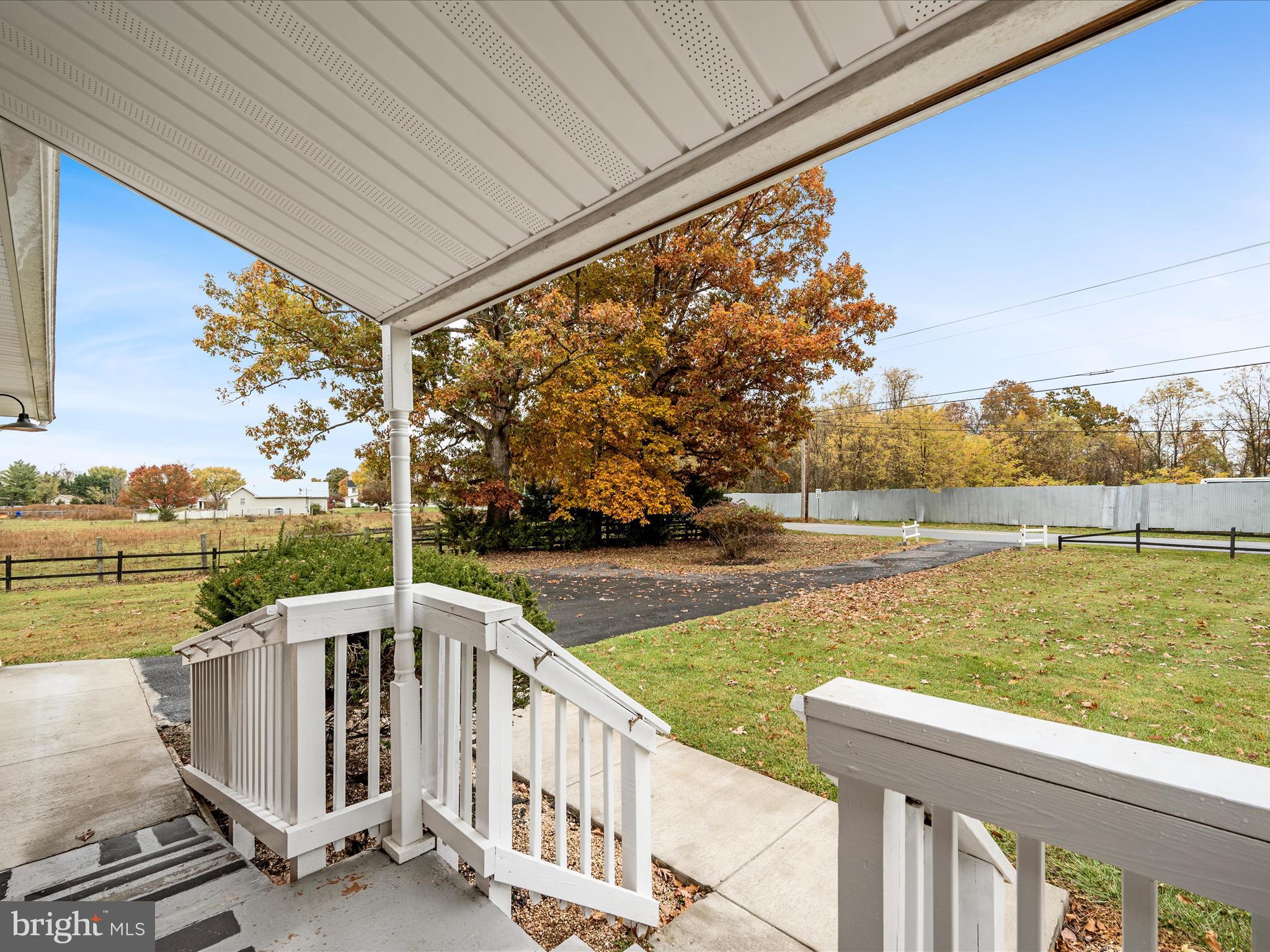 2311 Summit Point Road Summit Point, WV 25446 - Photo 4 of 46 a view of a lake with couches and city view
