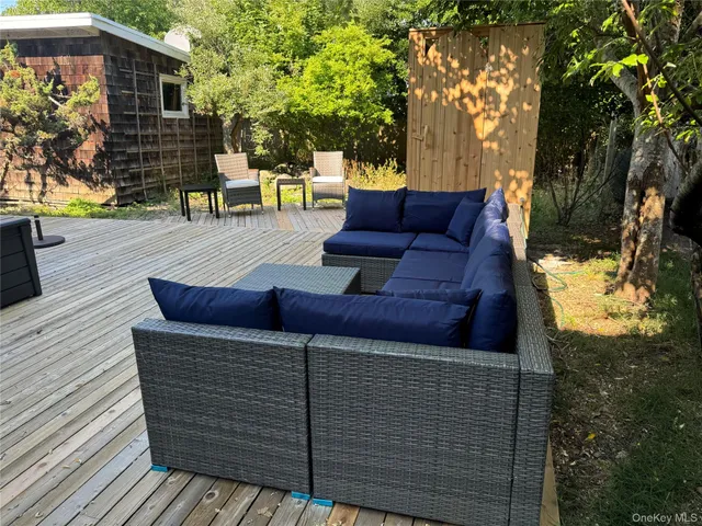 a view of outdoor sitting area with furniture