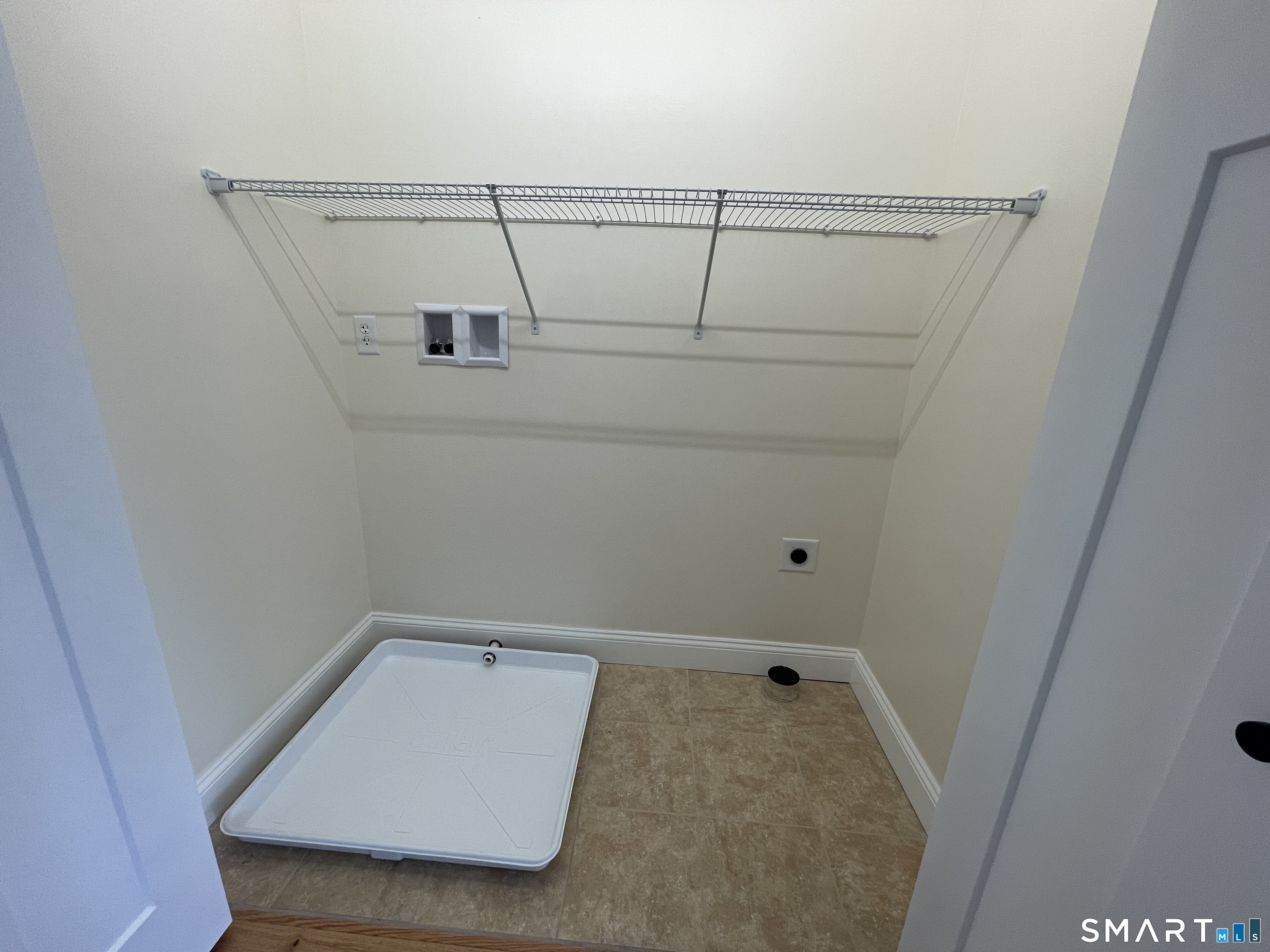 76 Wauregan Road Canterbury, CT 06331 - Photo 18 of 26 a view of a room with racks on the wall