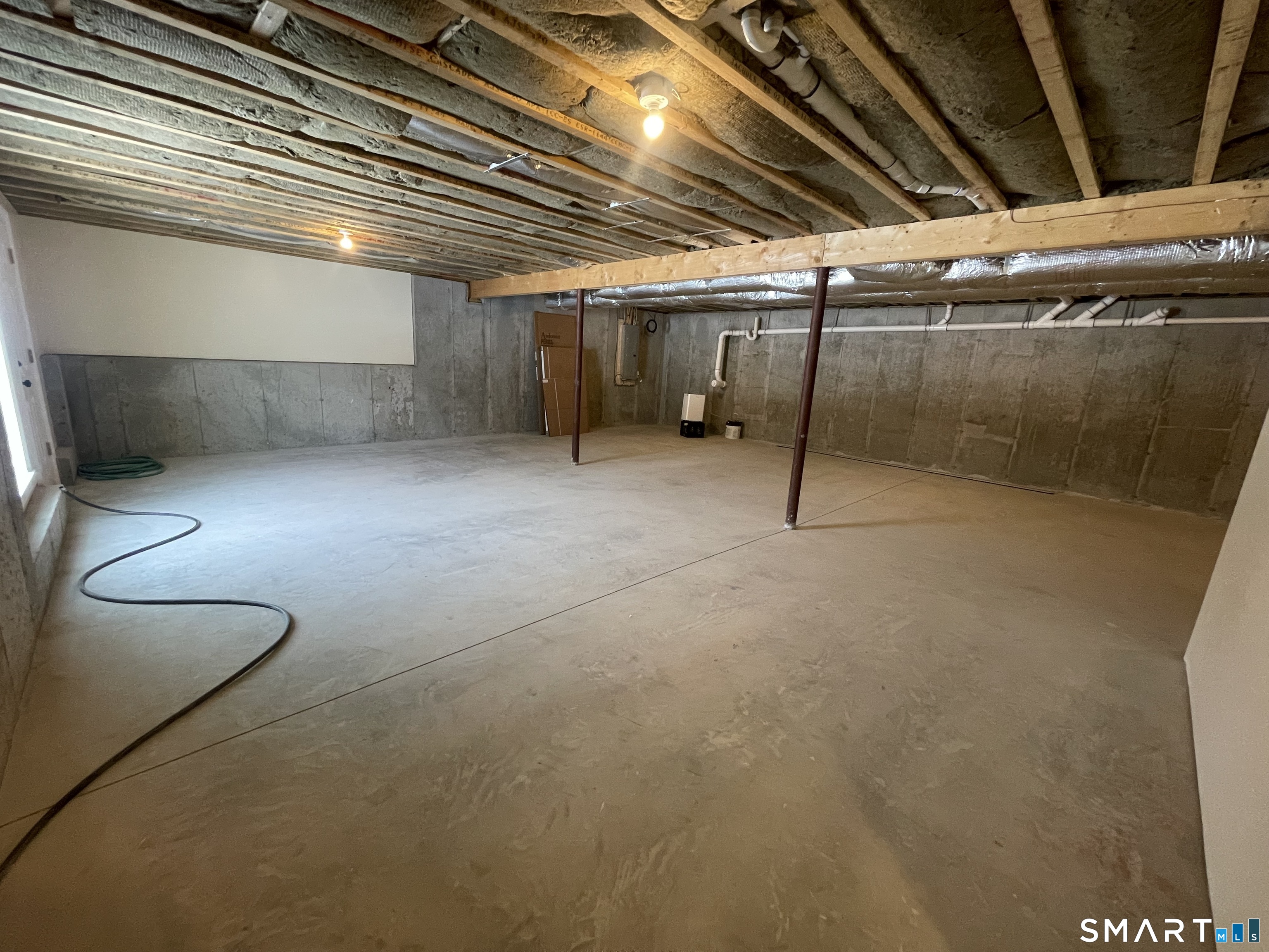 76 Wauregan Road Canterbury, CT 06331 - Photo 20 of 26 a view of a room with wooden racks