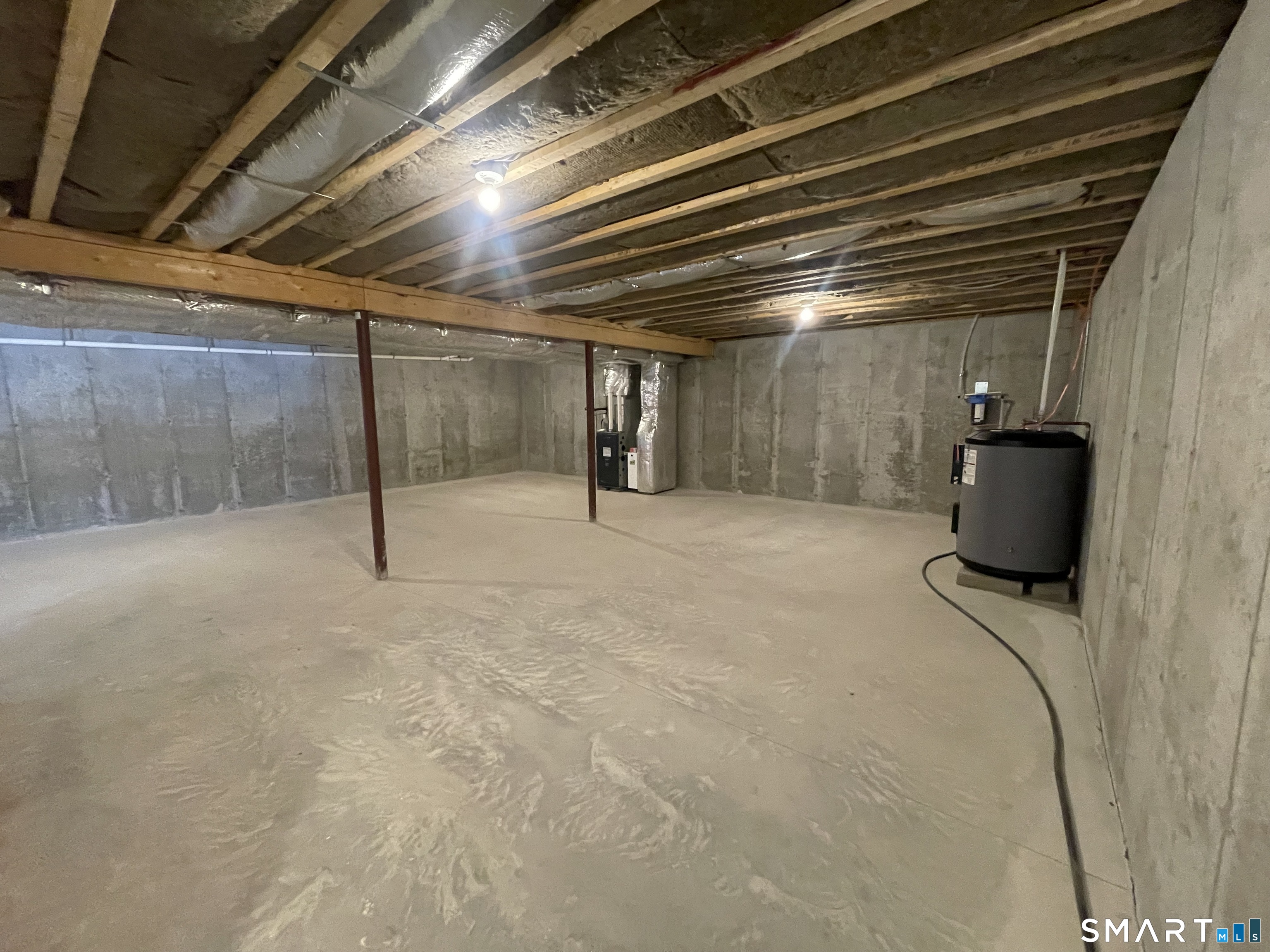 76 Wauregan Road Canterbury, CT 06331 - Photo 21 of 26 a view of empty room with wooden floor