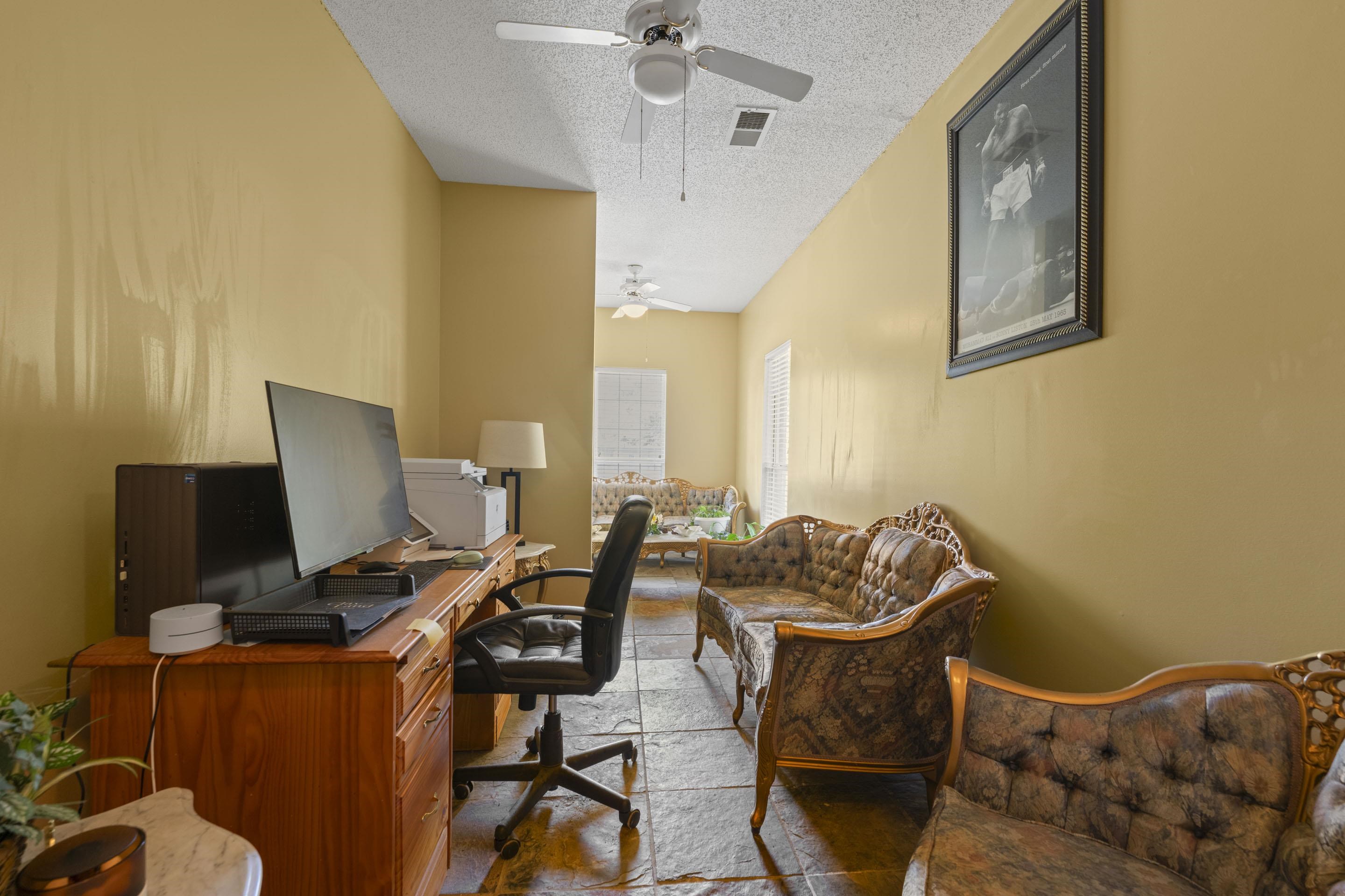 7265 Ward Road Millington, TN 38053 - Photo 23 of 29 Office area with a textured ceiling and stone tile flooring