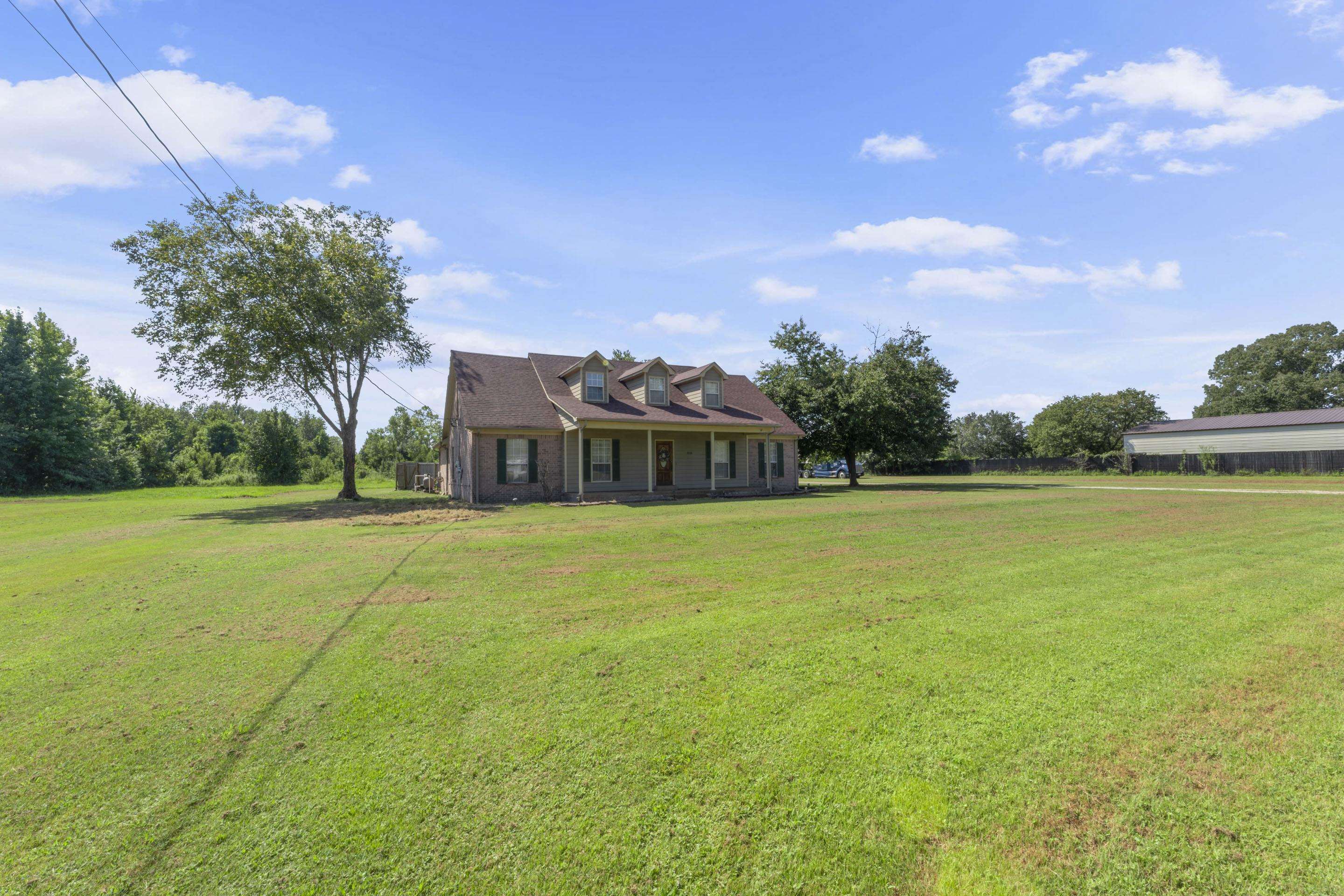7265 Ward Road Millington, TN 38053 - Photo 3 of 29 Cape cod home featuring a porch and a front yard