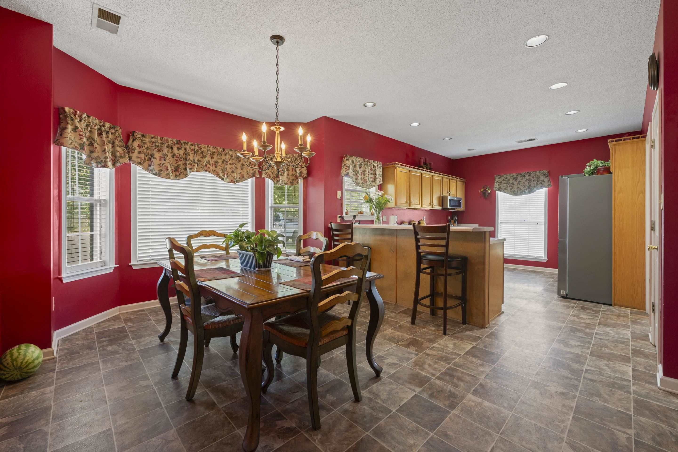 7265 Ward Road Millington, TN 38053 - Photo 8 of 29 Dining room with a chandelier, a textured ceiling, recessed lighting, and stone finish floors